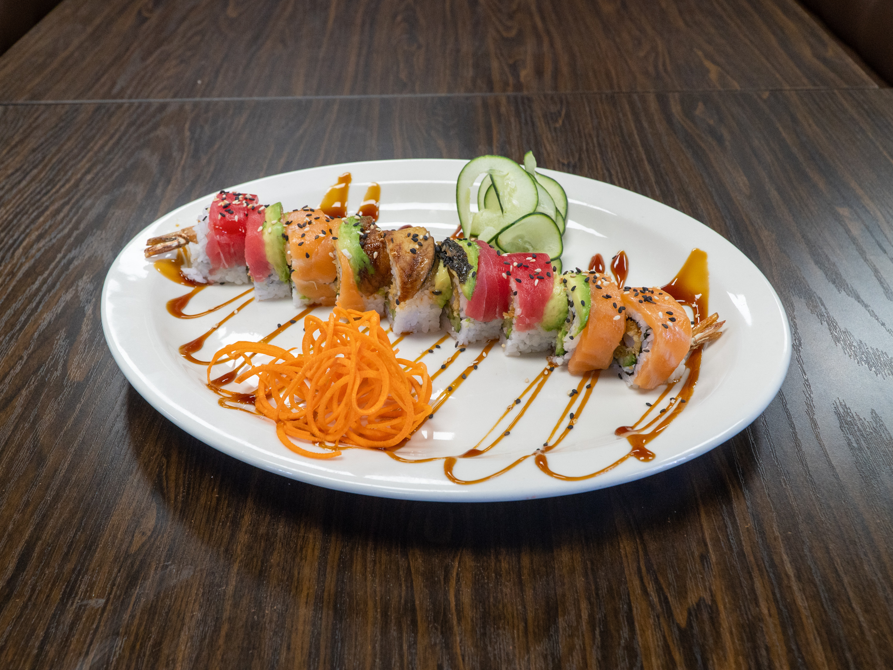 Order Rainbow Roll food online from Emporio Sushi & Mariscos store, Downey on bringmethat.com