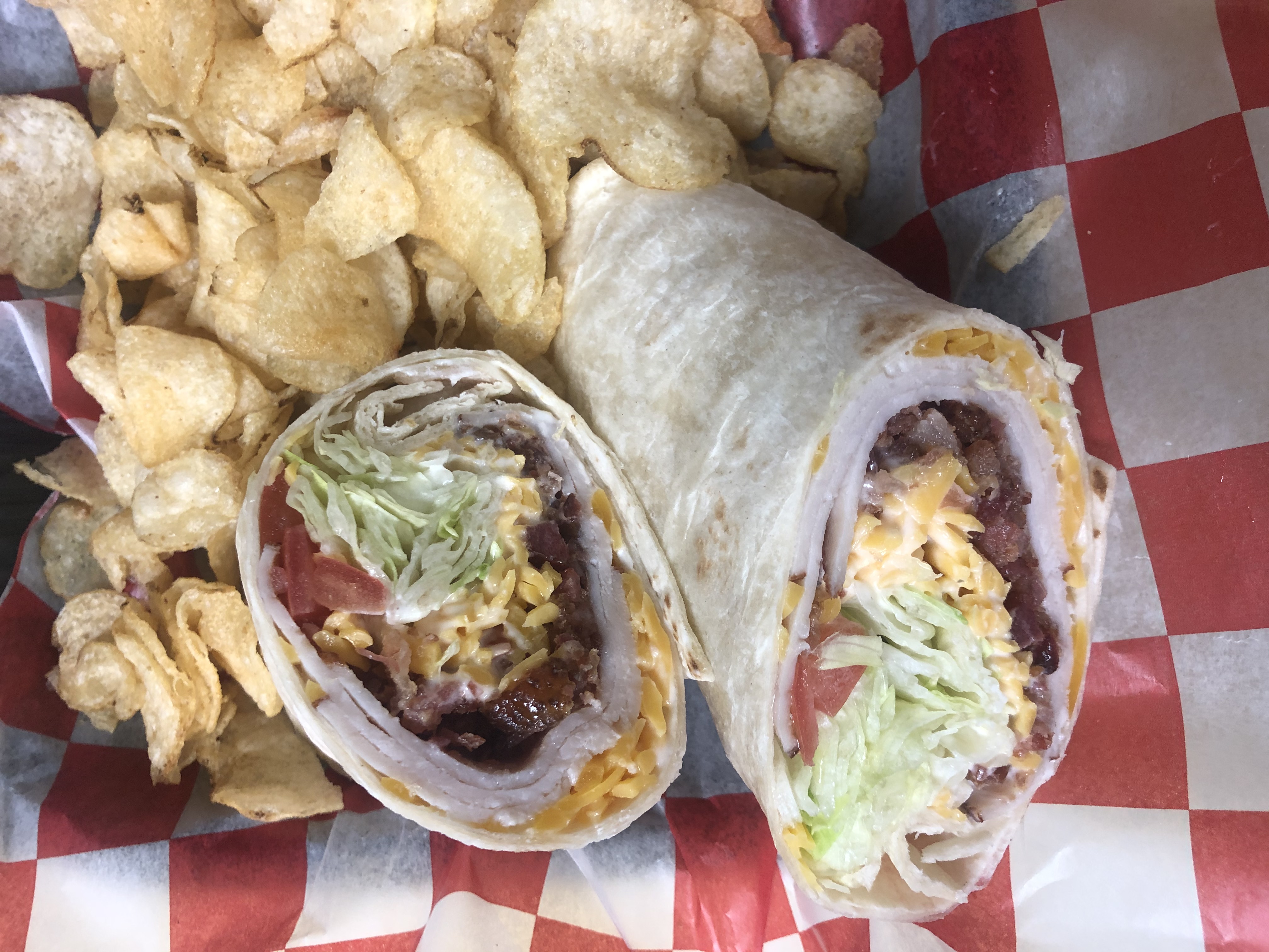 Order Turkey Bacon Ranch Wrap food online from R Bar Arena store, Columbus on bringmethat.com