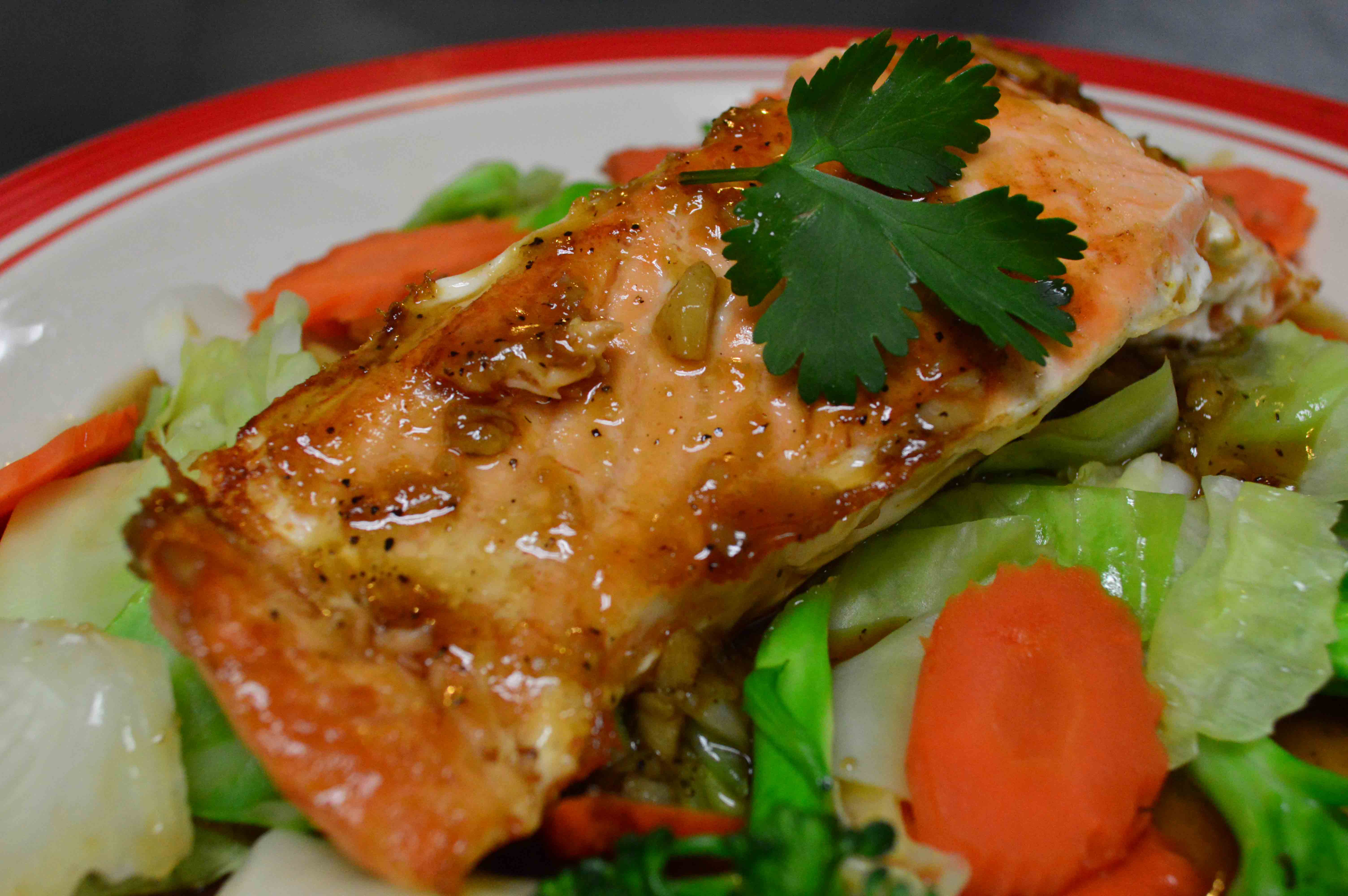 Order Salmon with Garlic Sauce food online from Thai Thai Cuisine store, Corona on bringmethat.com