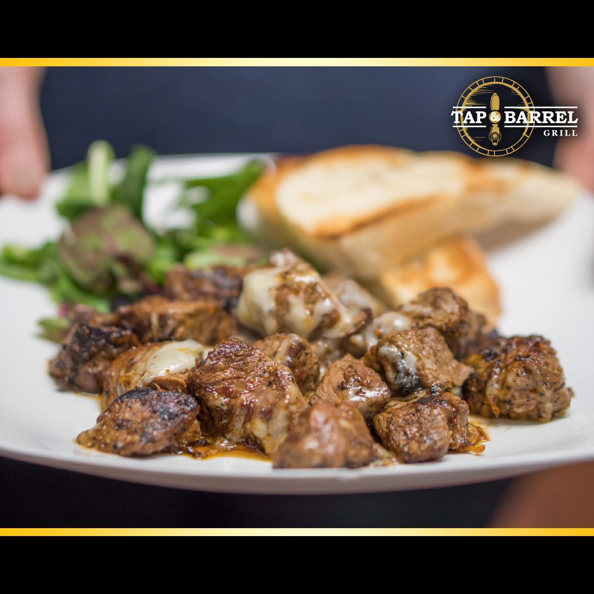 Order STEAK BITES food online from Tap & Barrel Grill store, Shelby Charter Township on bringmethat.com