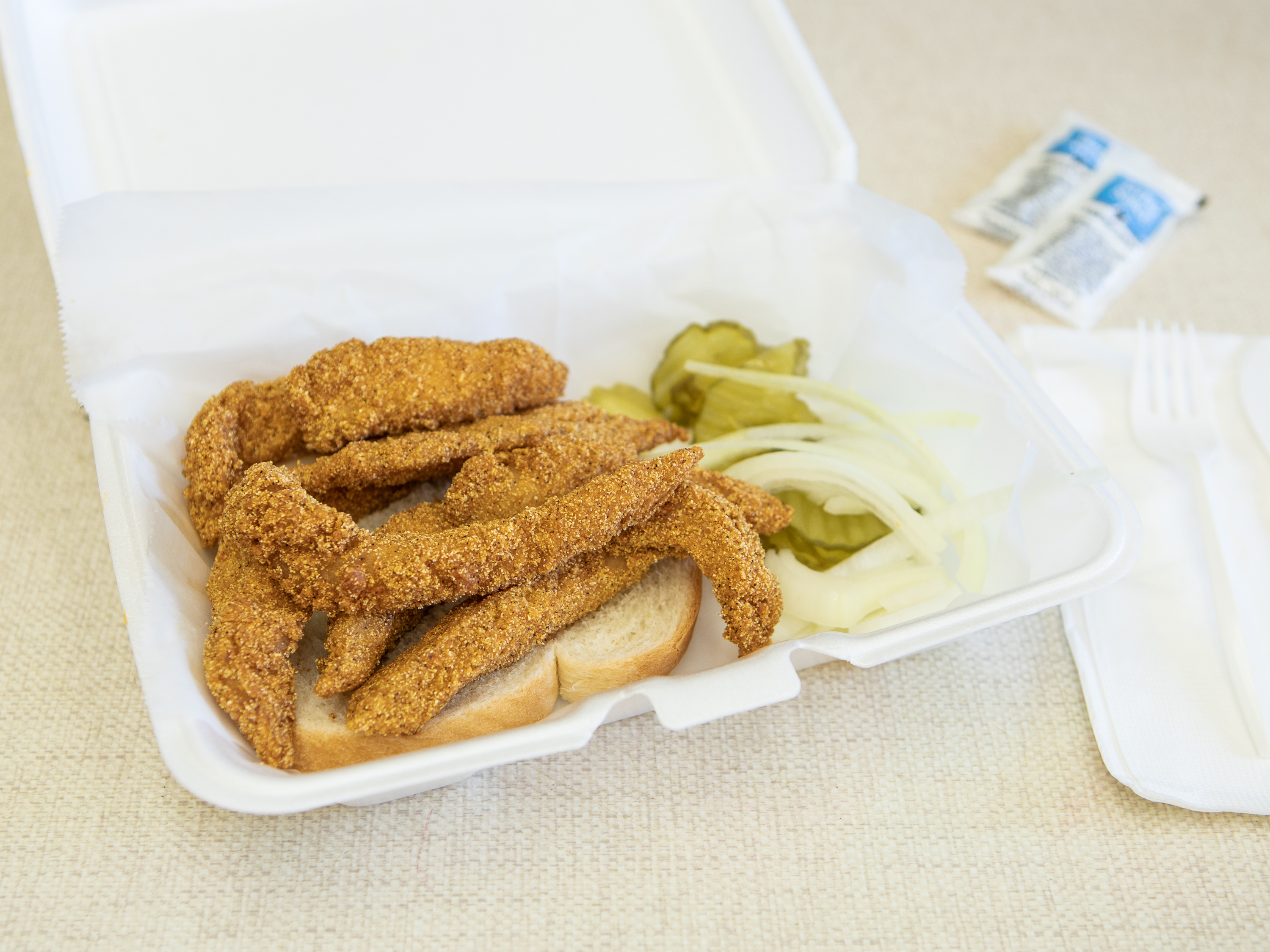 Order 9 Catfish Strips food online from Flyers Market store, East Saint Louis on bringmethat.com