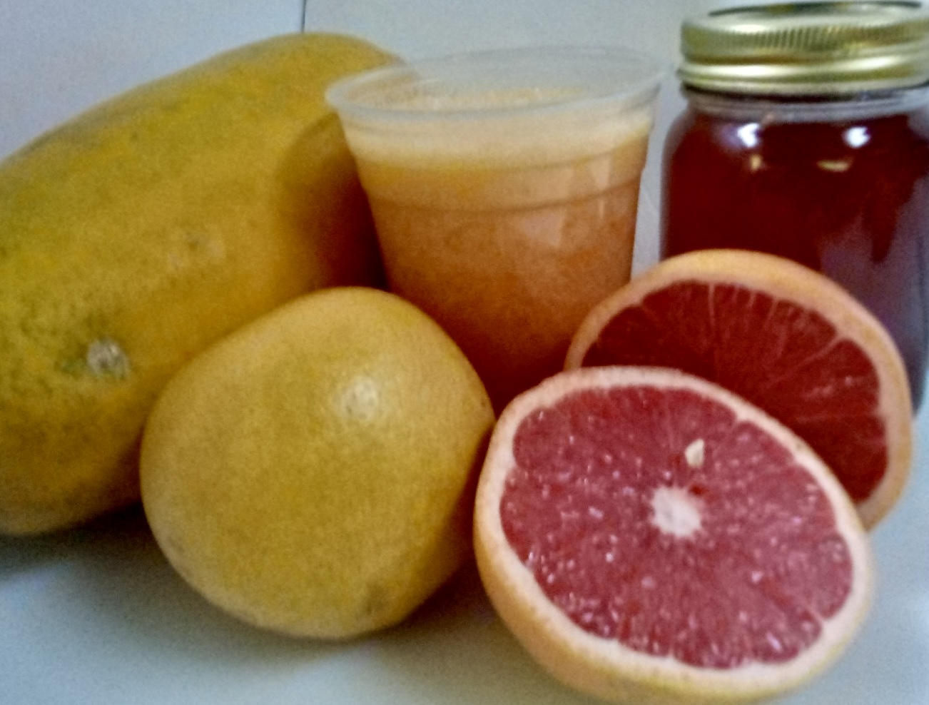 Order #26. Grapefruit, Papaya, Honey food online from El Papayon store, Ontario on bringmethat.com