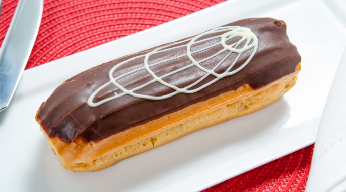 Order Jumbo Eclair food online from Tops American Grill, Bakery, & Bar store, Schenectady on bringmethat.com