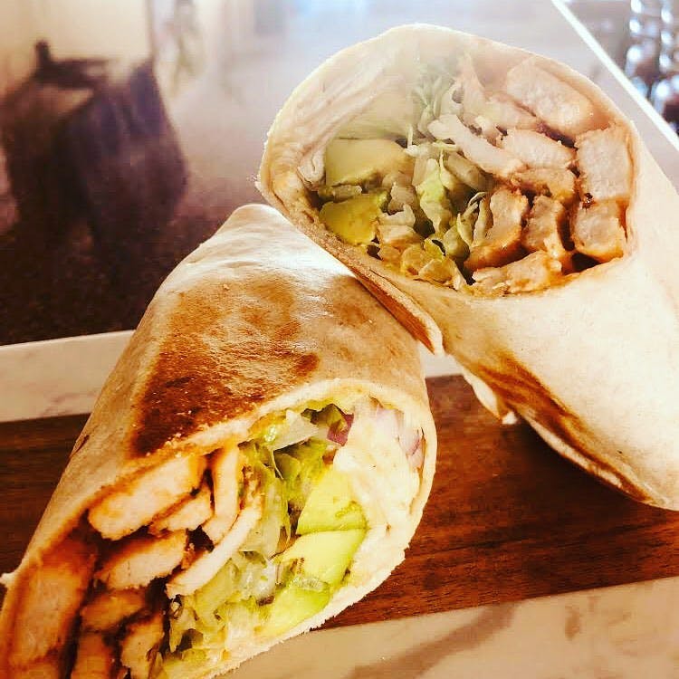 Order Grilled Chicken Caesar Wrap - Wrap food online from Badabing Pizzeria store, Middletown on bringmethat.com