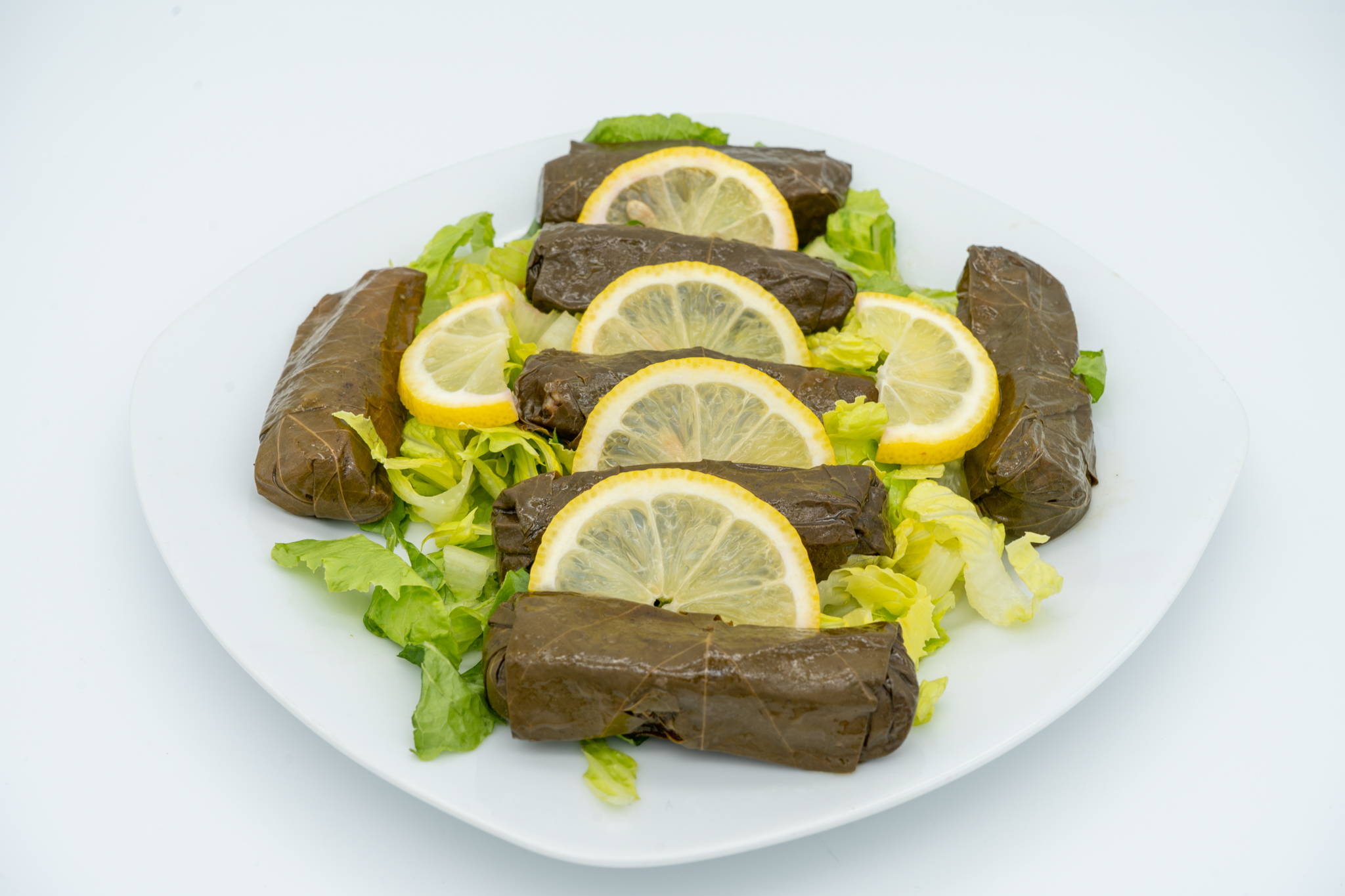 Order 7 Pieces Grape Leaves food online from Sallora & Sam Bakery Grill And Catering store, Bridgeview on bringmethat.com