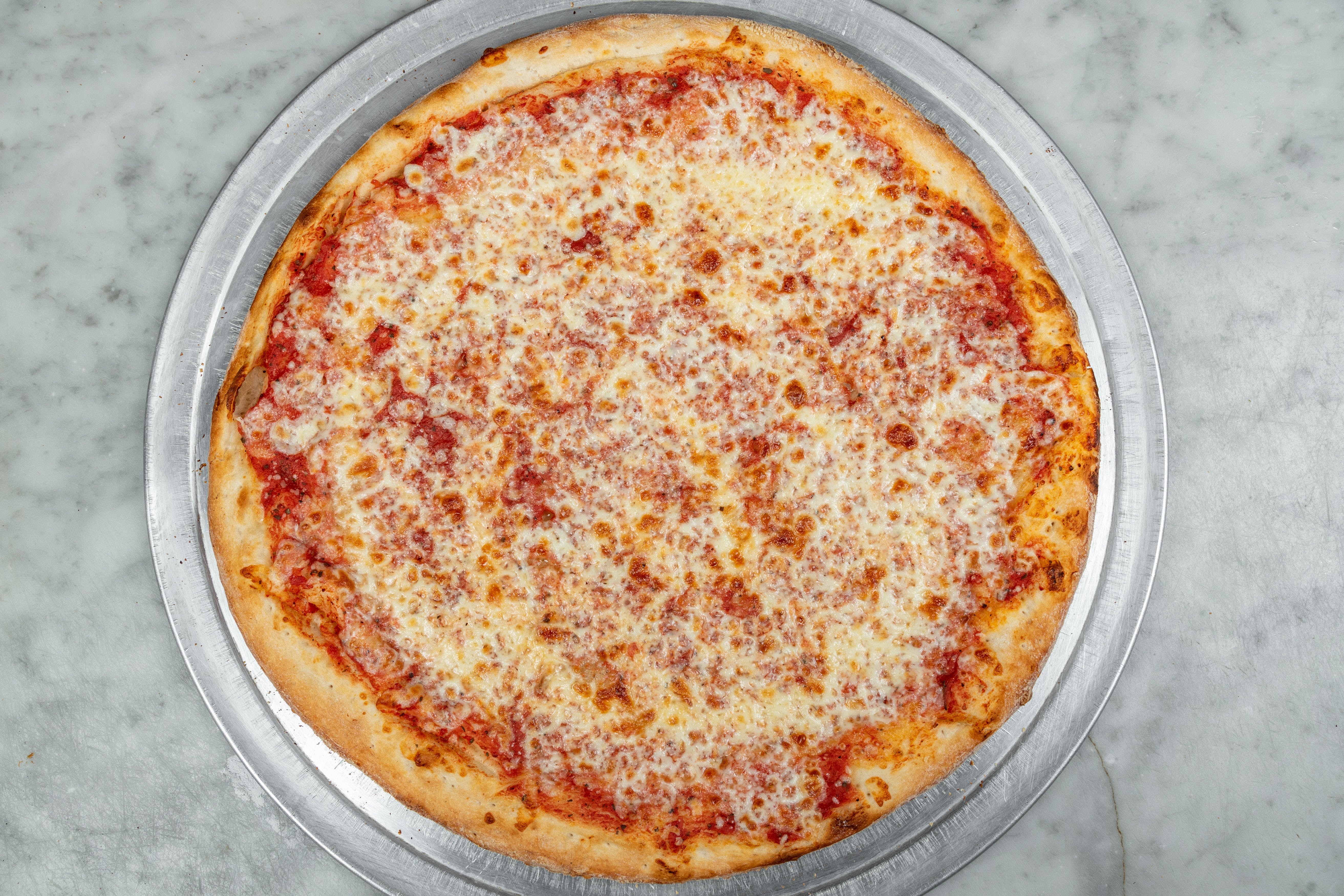 Order Regular Cheese Pizza - Medium 14'' food online from Rams Pizza Plus store, Bronx on bringmethat.com
