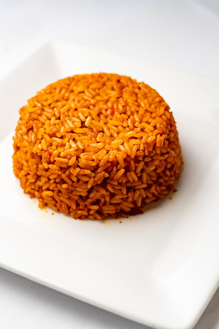 Order Jollof Rice food online from Hills Kitchen store, Brooklyn on bringmethat.com