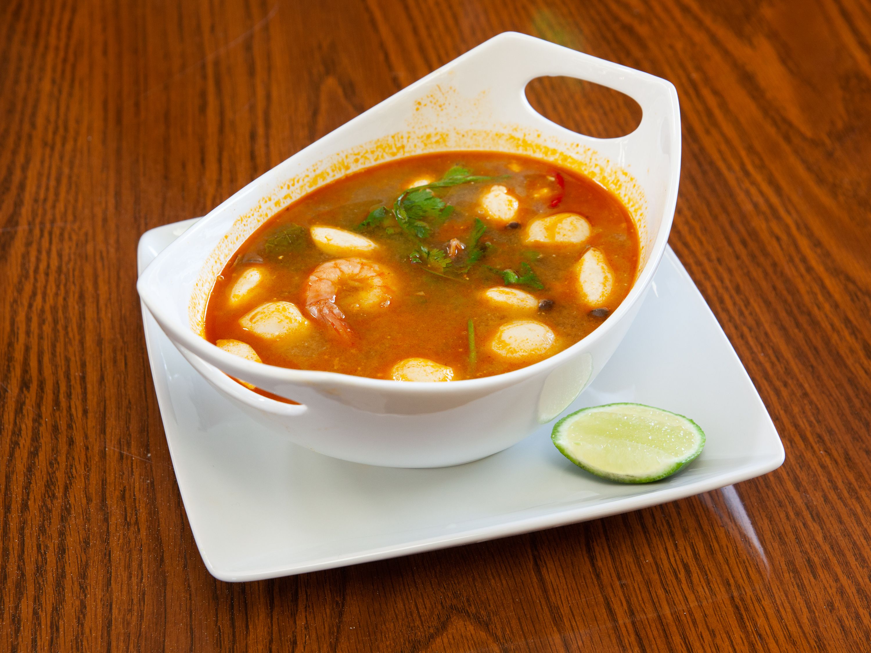 Order Tom Yum Soup (Thai Hot & Sour Soup) food online from Aladdin Food Express store, Fort Wayne on bringmethat.com