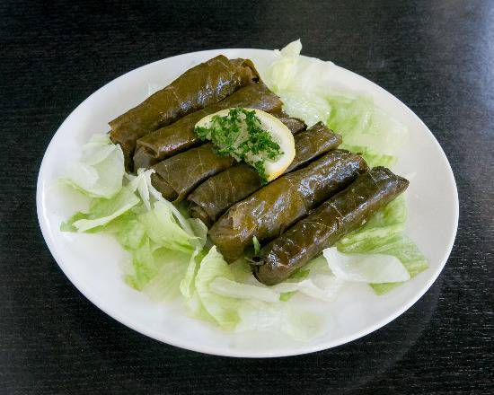 Order Grape Leaves (6 pcs) food online from John Kabobs 2 store, Commerce on bringmethat.com