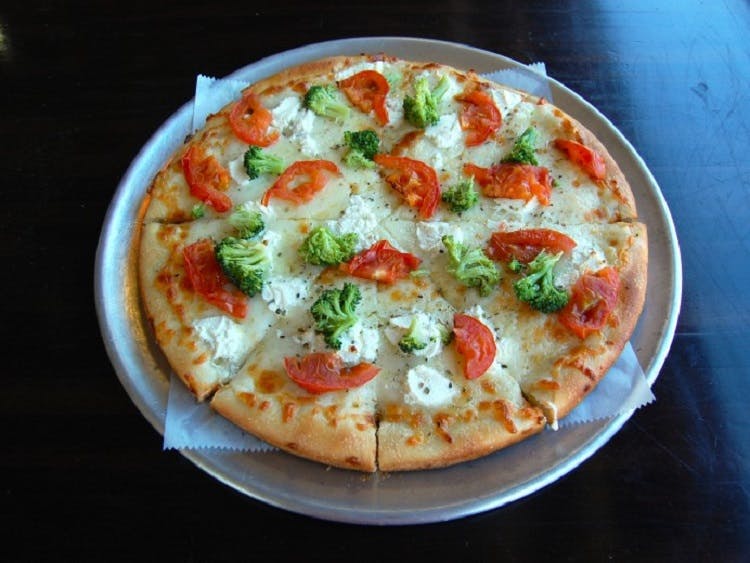 Order White Vegetable Pizza - Medium 12'' food online from Claymont Steak Shop store, Claymont on bringmethat.com