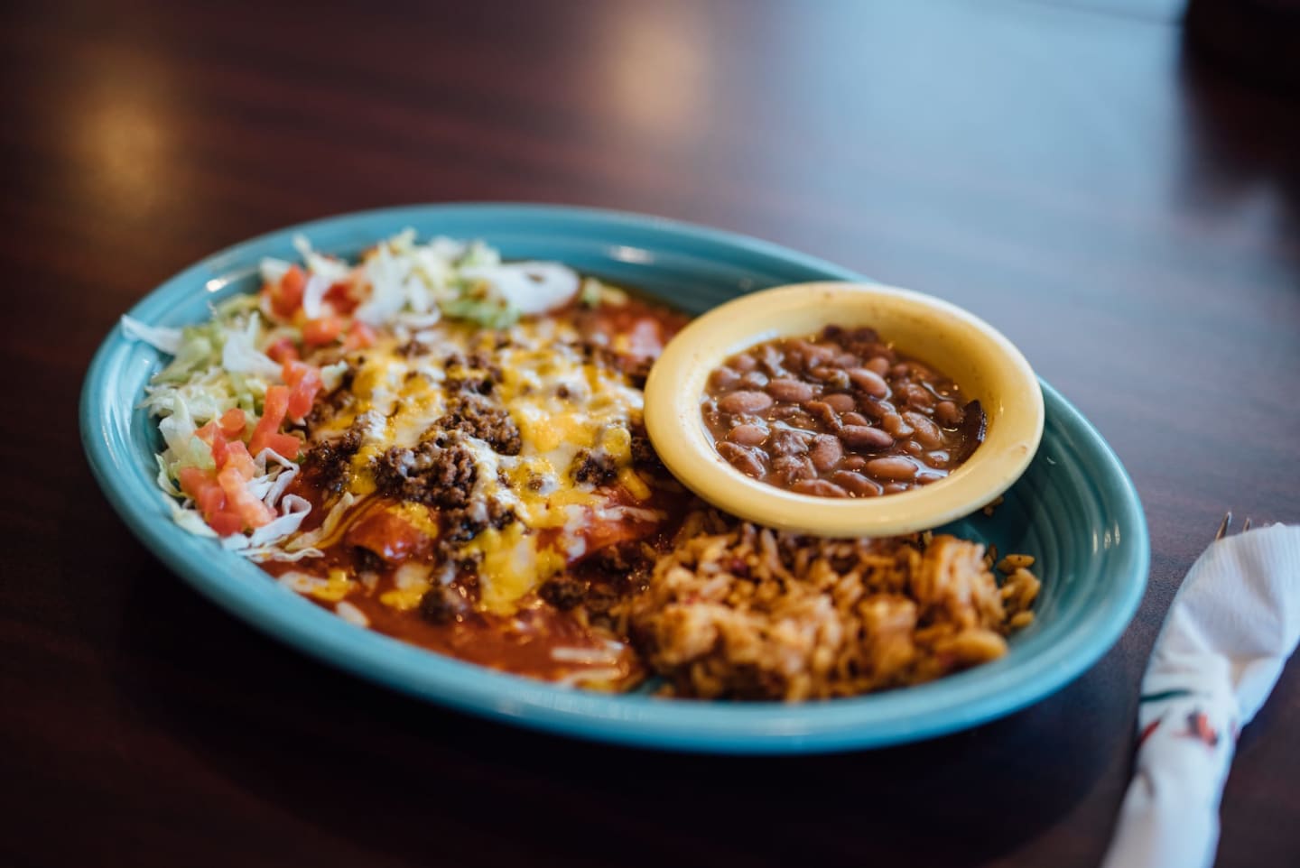 Order New Mexico Style Enchiladas cHEESE  food online from Peppers Grill & Bar store, Roswell on bringmethat.com