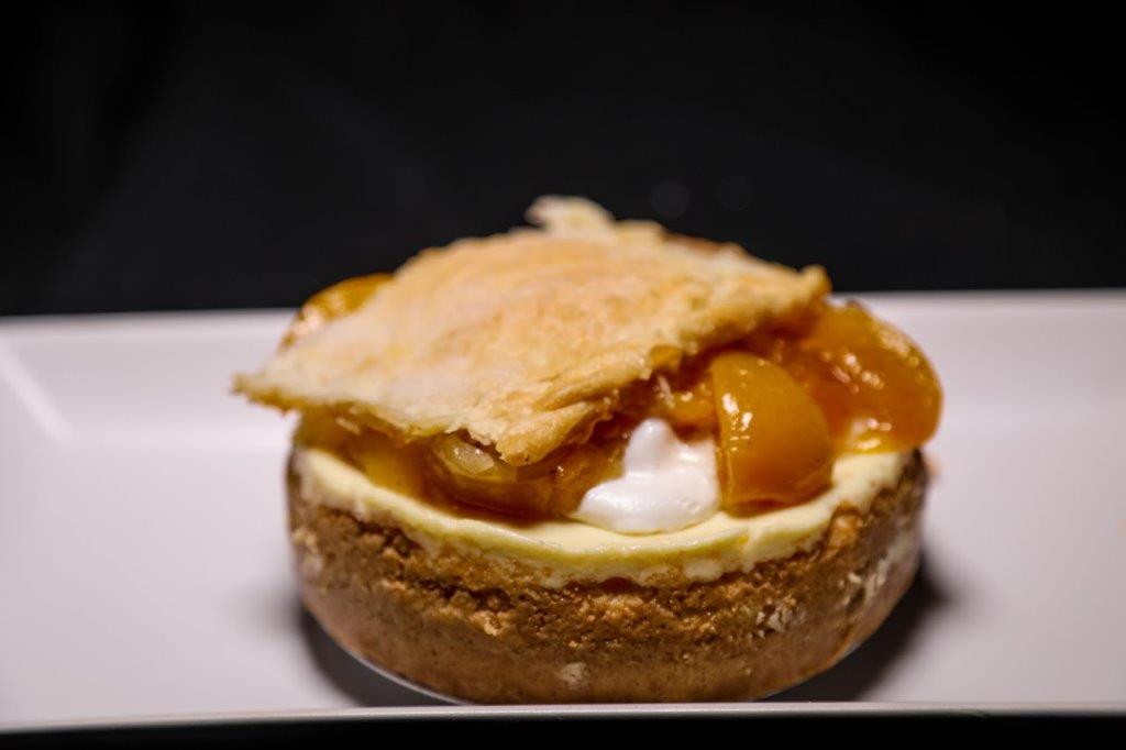 Order Cheesecake - Peach Cobbler food online from Sugar Rush Too store, Houston on bringmethat.com