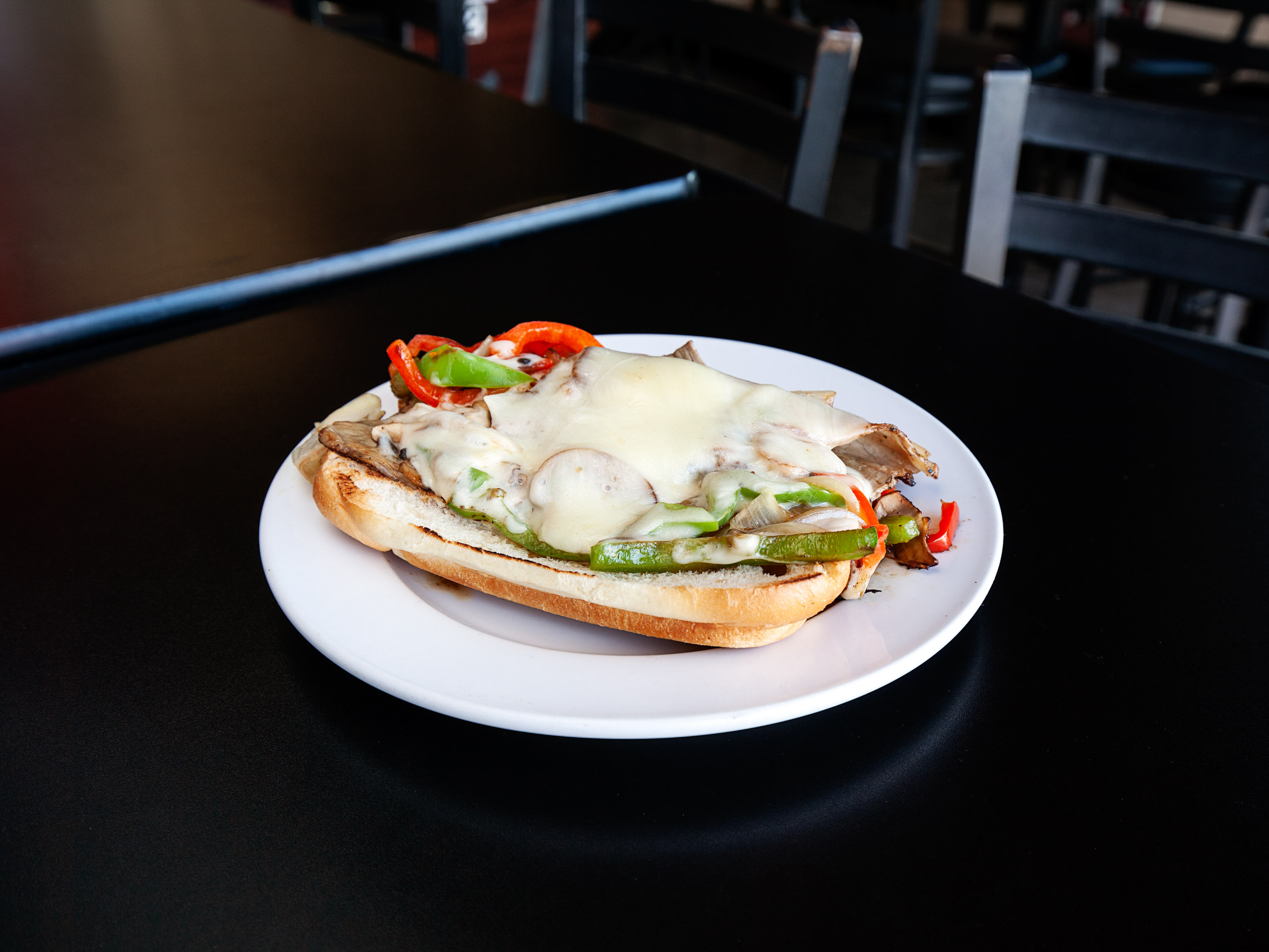Order Philly Cheese Steak Sandwich food online from Garage Bar & Grille store, Vancouver on bringmethat.com