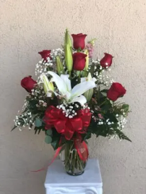 Order 1/2 Dozen Roses with Lilys food online from Hand Creations Flower Shop & Events store, Ceres on bringmethat.com