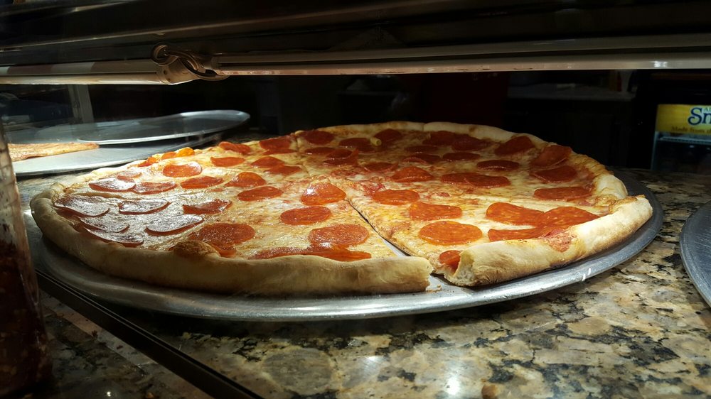 Order 1 Topping Slice food online from Pizza Park store, New York on bringmethat.com