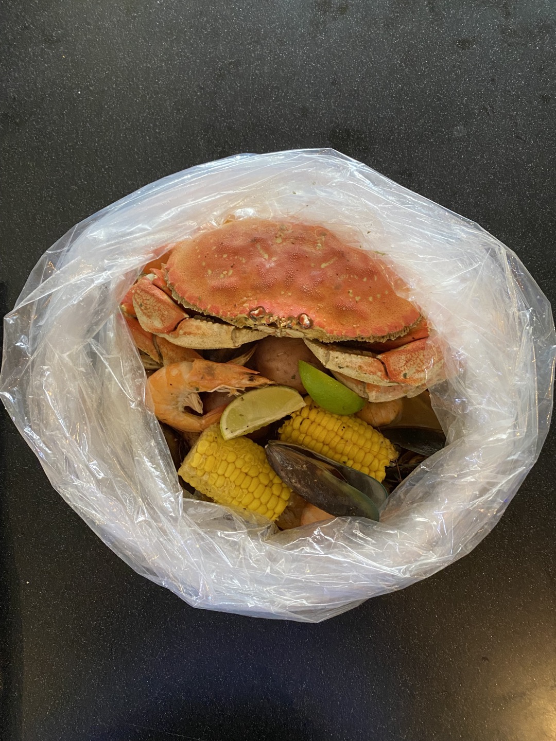 Order KnK Combo #C (Dungeness Crab)w/2Choice food online from Krack N Krab store, Los Angeles on bringmethat.com