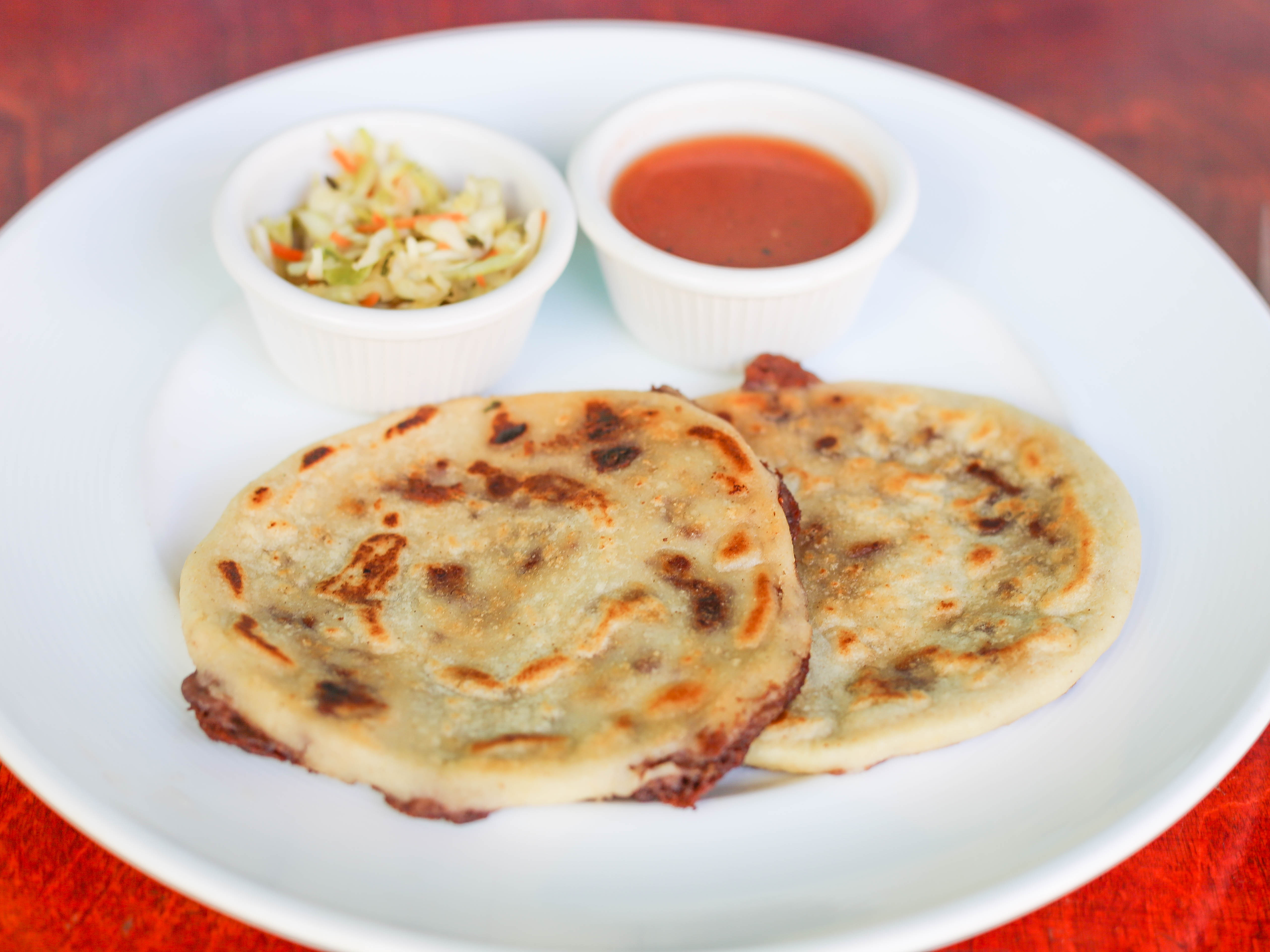 Order Pork and Cheese Pupusa food online from Dmaize store, San Francisco on bringmethat.com