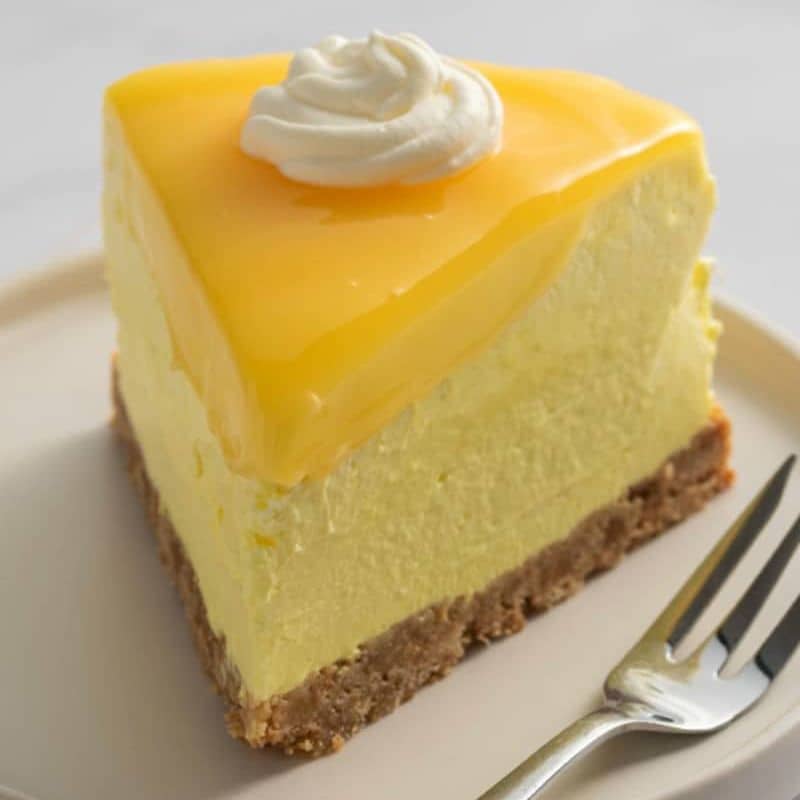 Order Vanilla-Passion Fruit Cheesecake food online from Chocolate store, Santa Cruz on bringmethat.com
