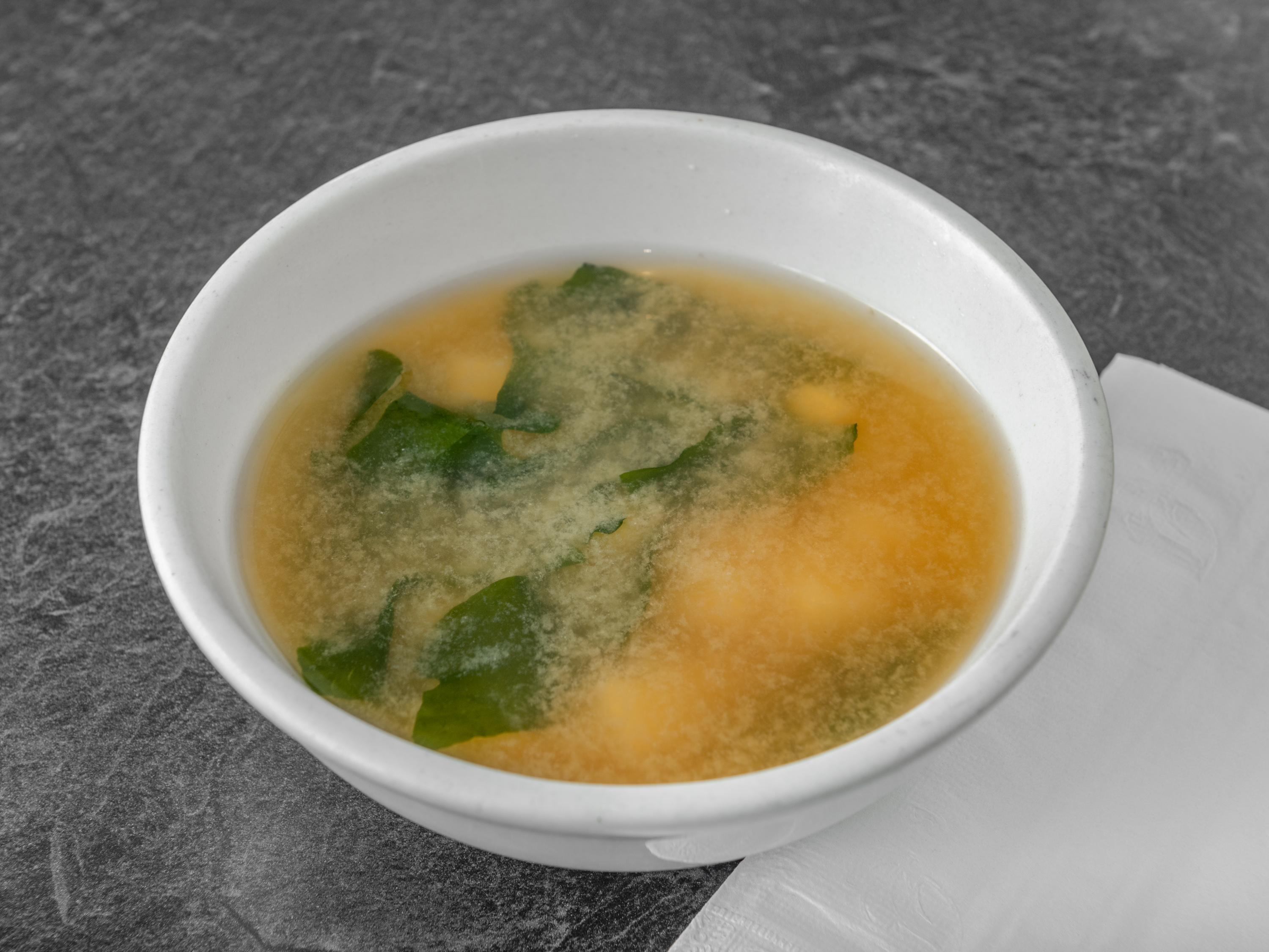 Order 15. Miso Soup (Individual Serving) food online from Thai Noodles Cafe store, Libertyville on bringmethat.com