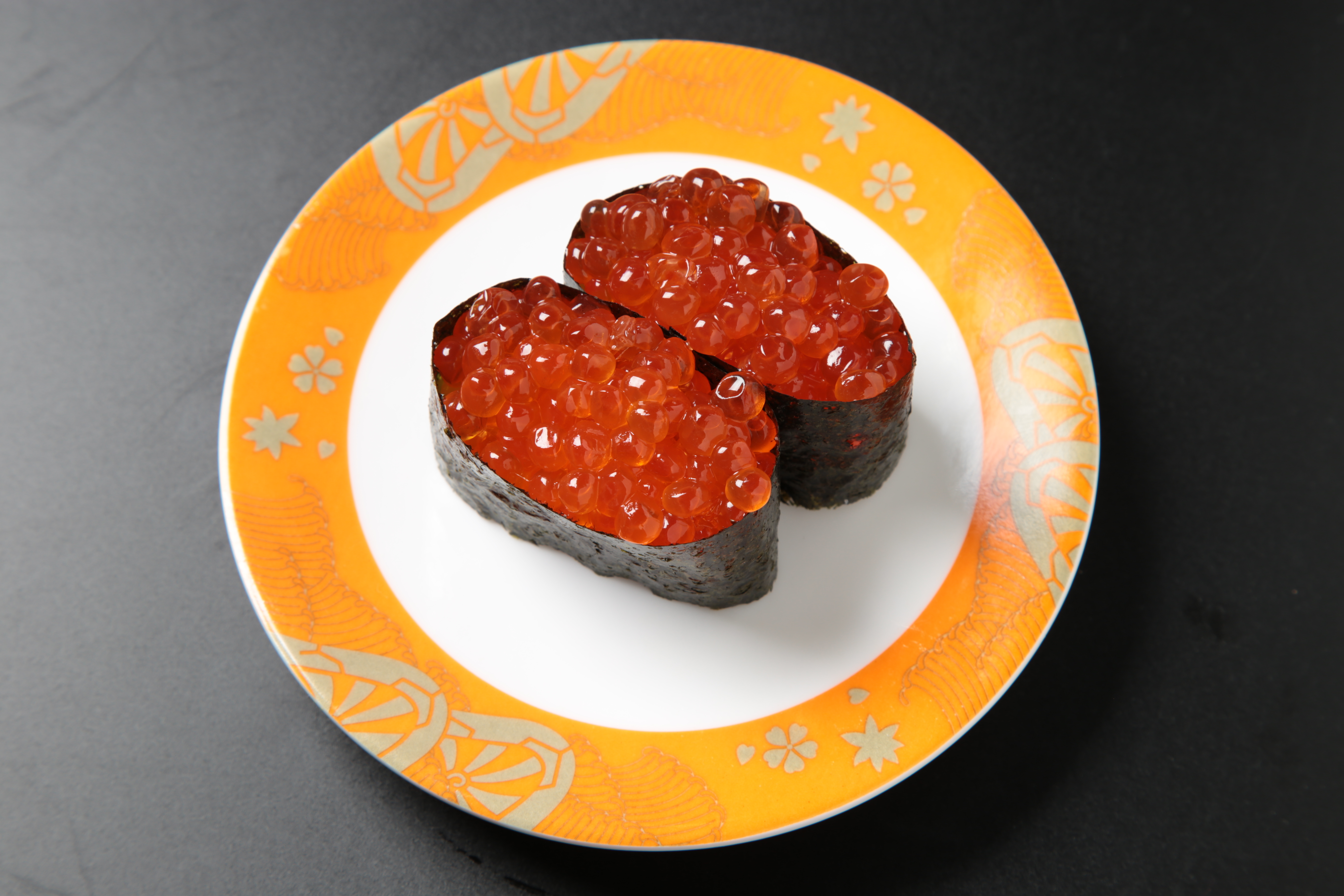 Order Ikura Gunkan food online from Izumi Revolving Sushi store, Daly City on bringmethat.com