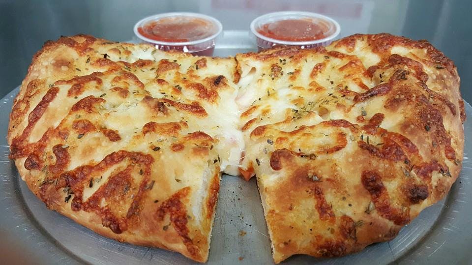 Order Calzone - Calzones food online from Pizza Land store, Avon on bringmethat.com