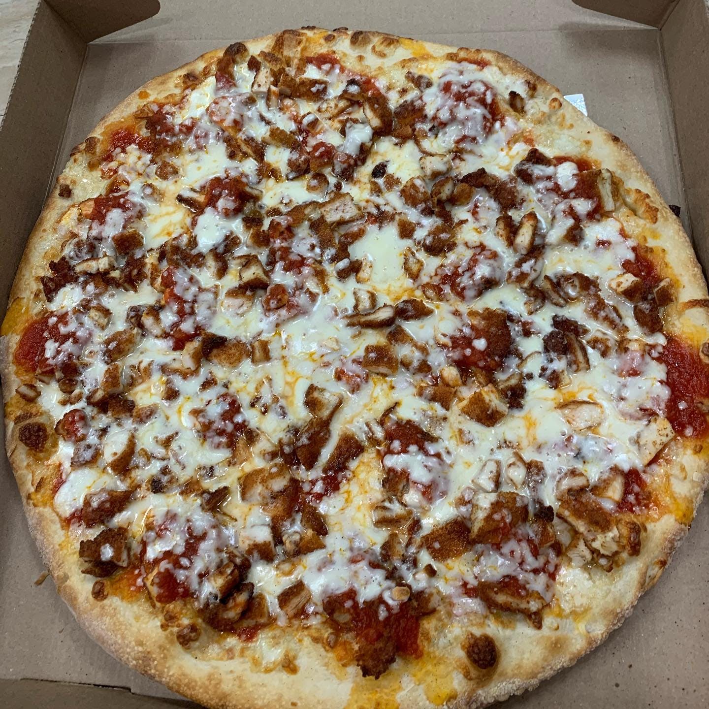 Order Chicken Parm Pizza - Pizza food online from Lorenzo's Pizza store, Staten Island on bringmethat.com