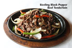 Order 73. Sizzling Sliced Beef Tenderloin with Black Pepper  food online from Triple Crown Restaurant store, Chicago on bringmethat.com