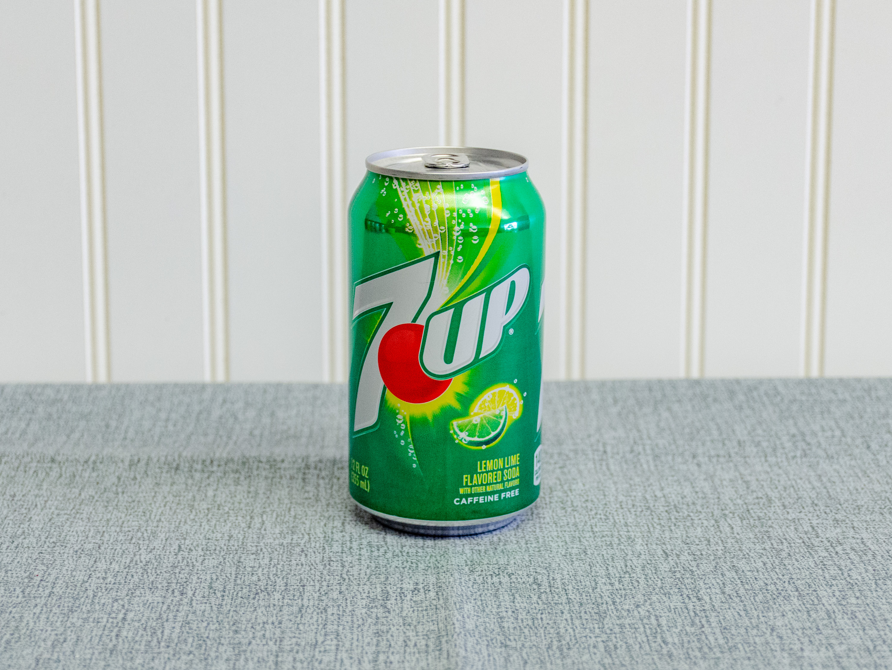 Order 12oz. 7Up (Can) food online from Just Dash It store, Englewood on bringmethat.com