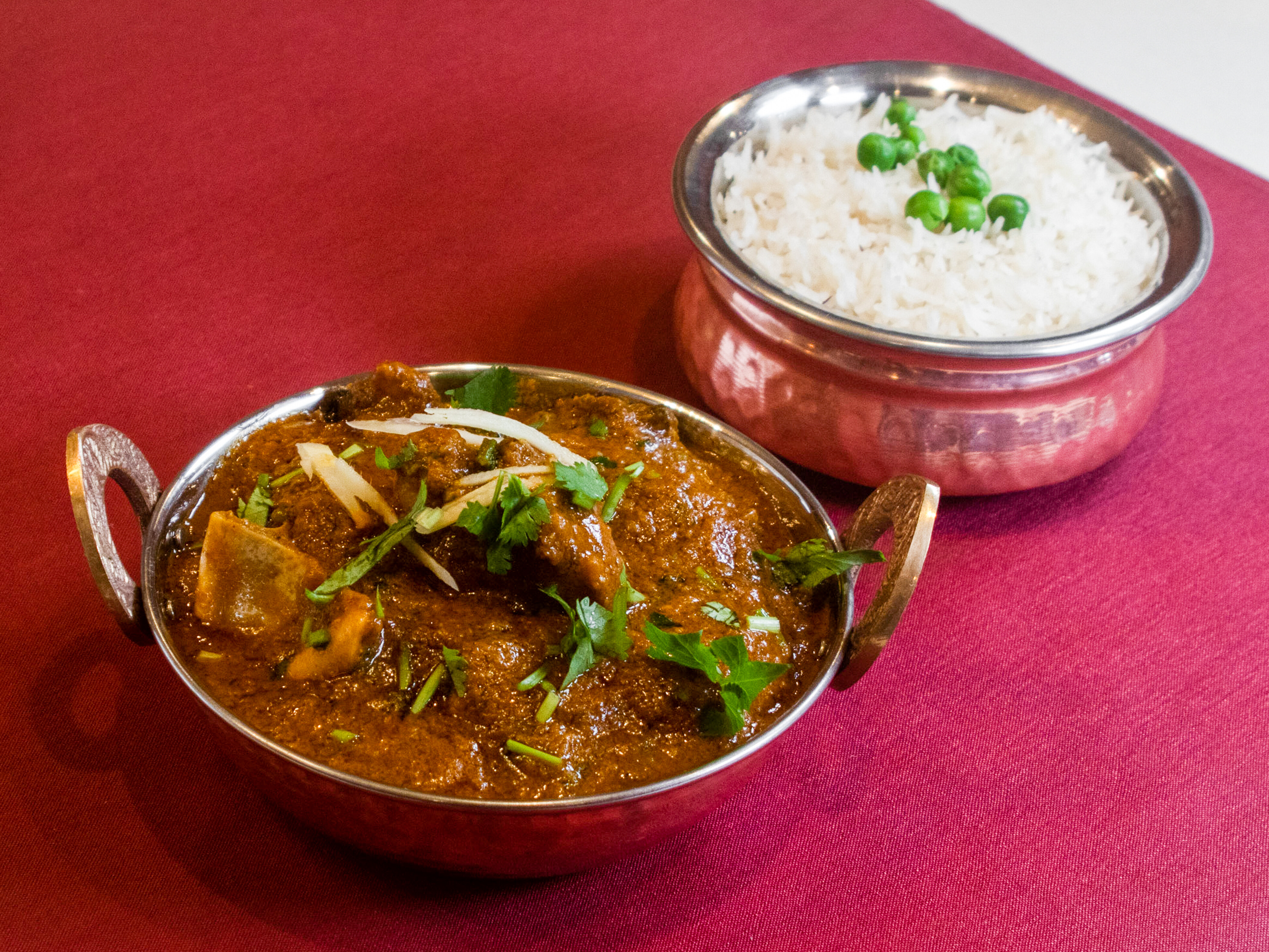 Order Goat Curry food online from Raaga Tandoor store, Burke on bringmethat.com