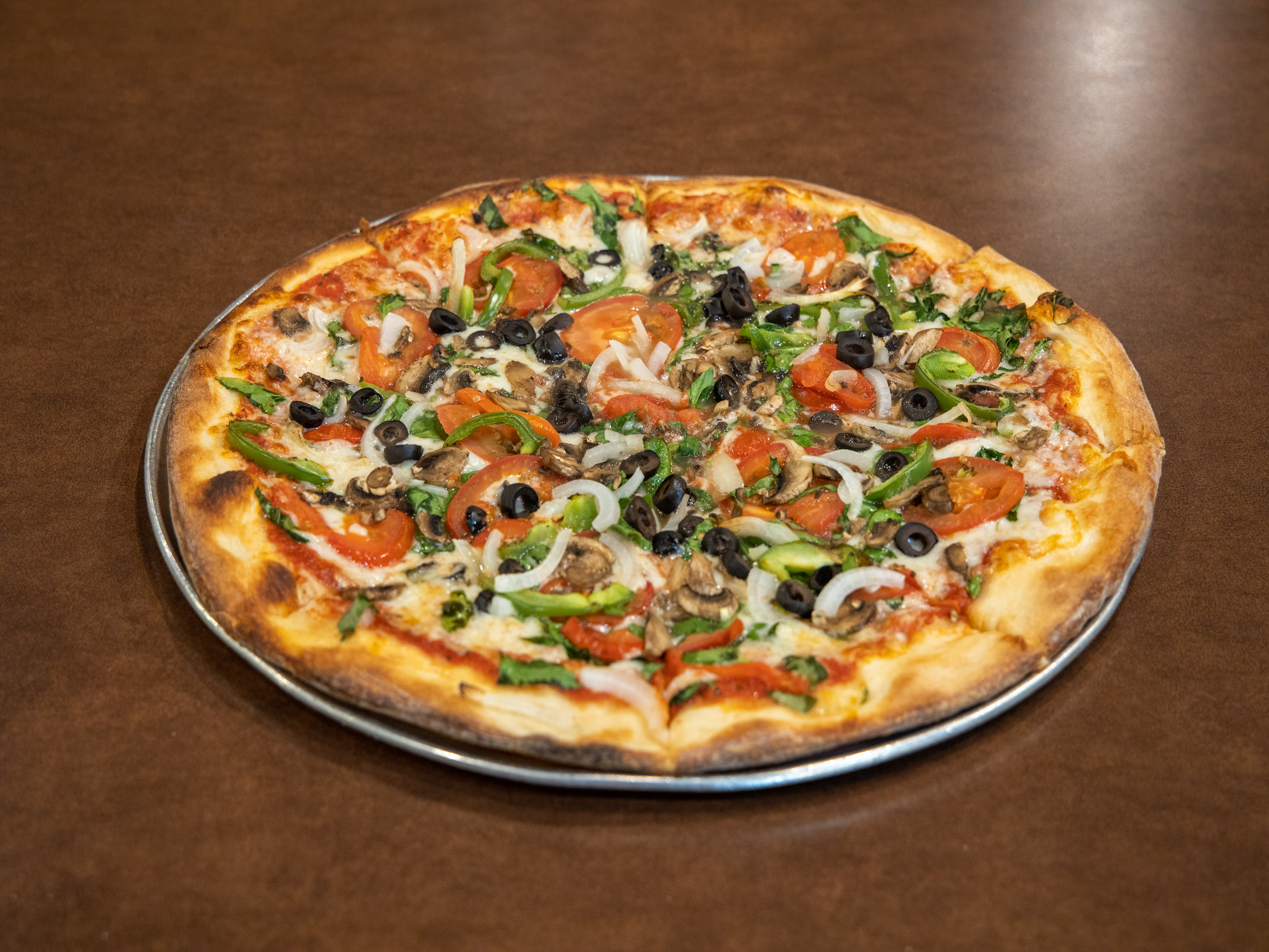 Order 12" Medium Vegetarian Pizza food online from New York Pizzeria store, Katy on bringmethat.com