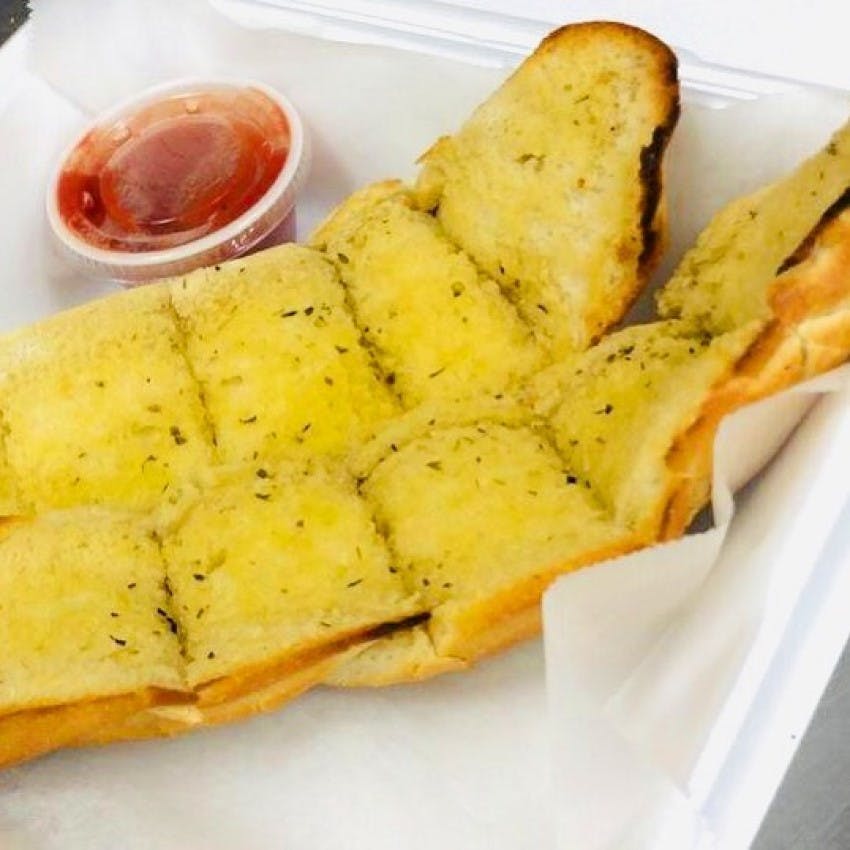 Order Garlic Bread - Appetizer food online from Milanos Pizza store, Providence on bringmethat.com