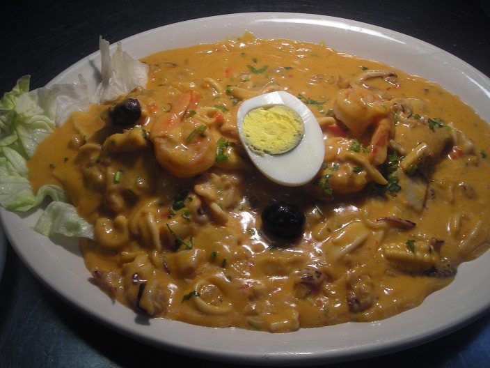 Order 30. Picante de Mariscos food online from Mily & Lalo Peruvian Restaurant store, Charlotte on bringmethat.com