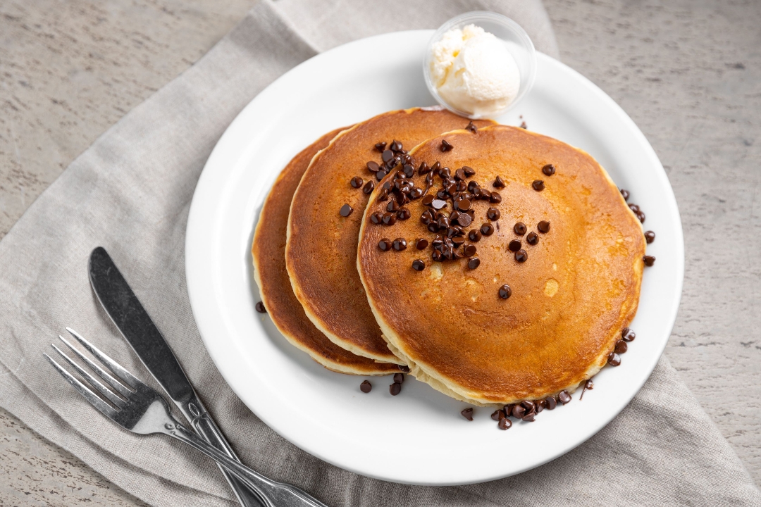 Order Chocolate Chip Pancakes food online from Keno Restaurant store, Anaheim on bringmethat.com
