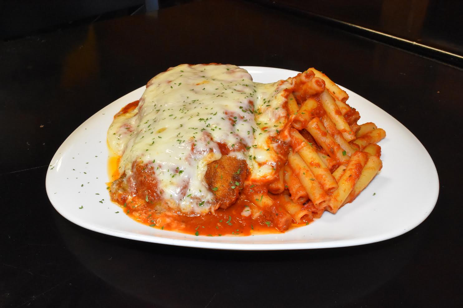 Order Eggplant Parmigiana food online from Giddy's Pizzeria & Restaurant store, East Brunswick on bringmethat.com