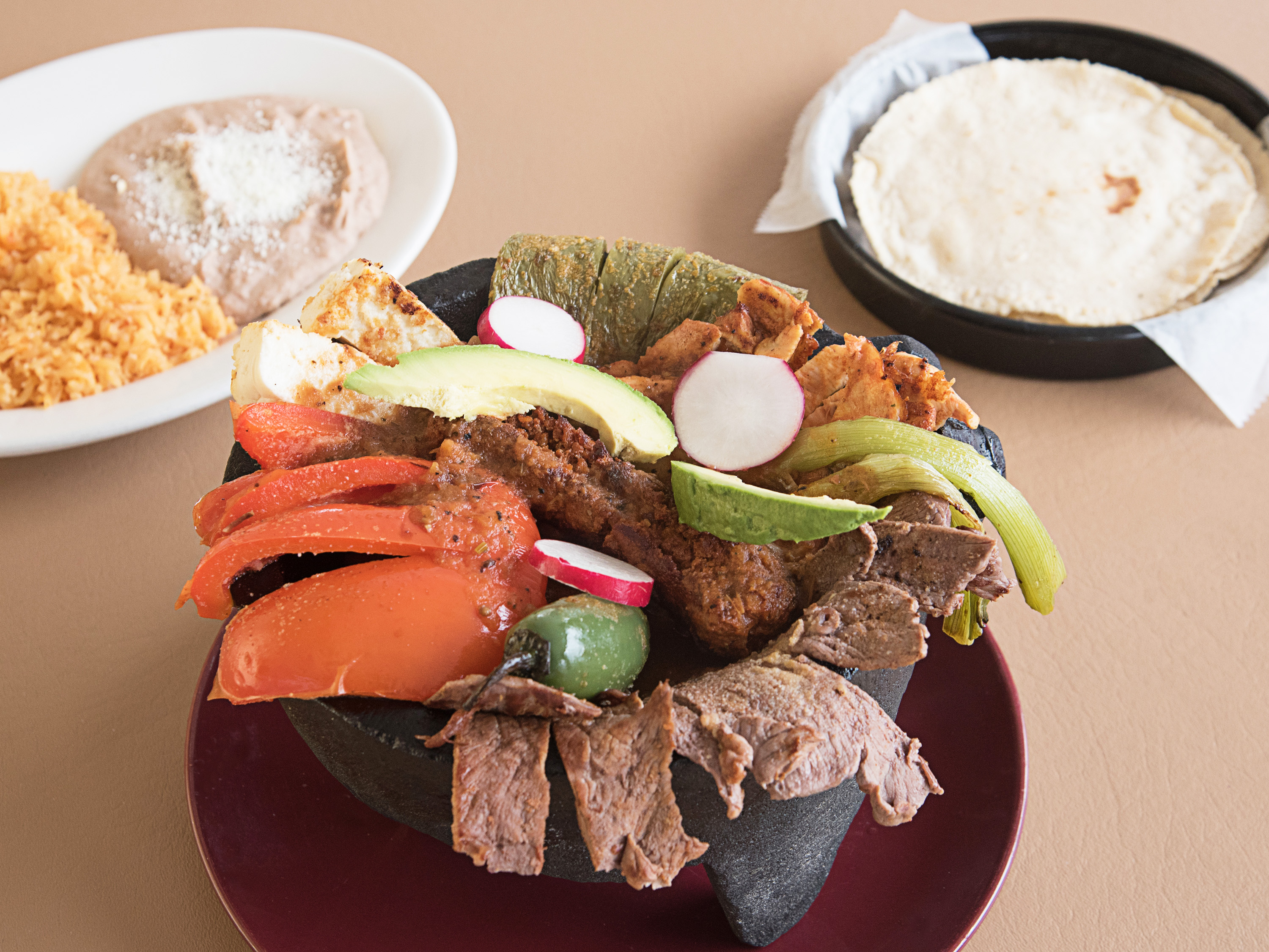 Order Molcajete food online from Taqueria Los Compadres store, Newark on bringmethat.com