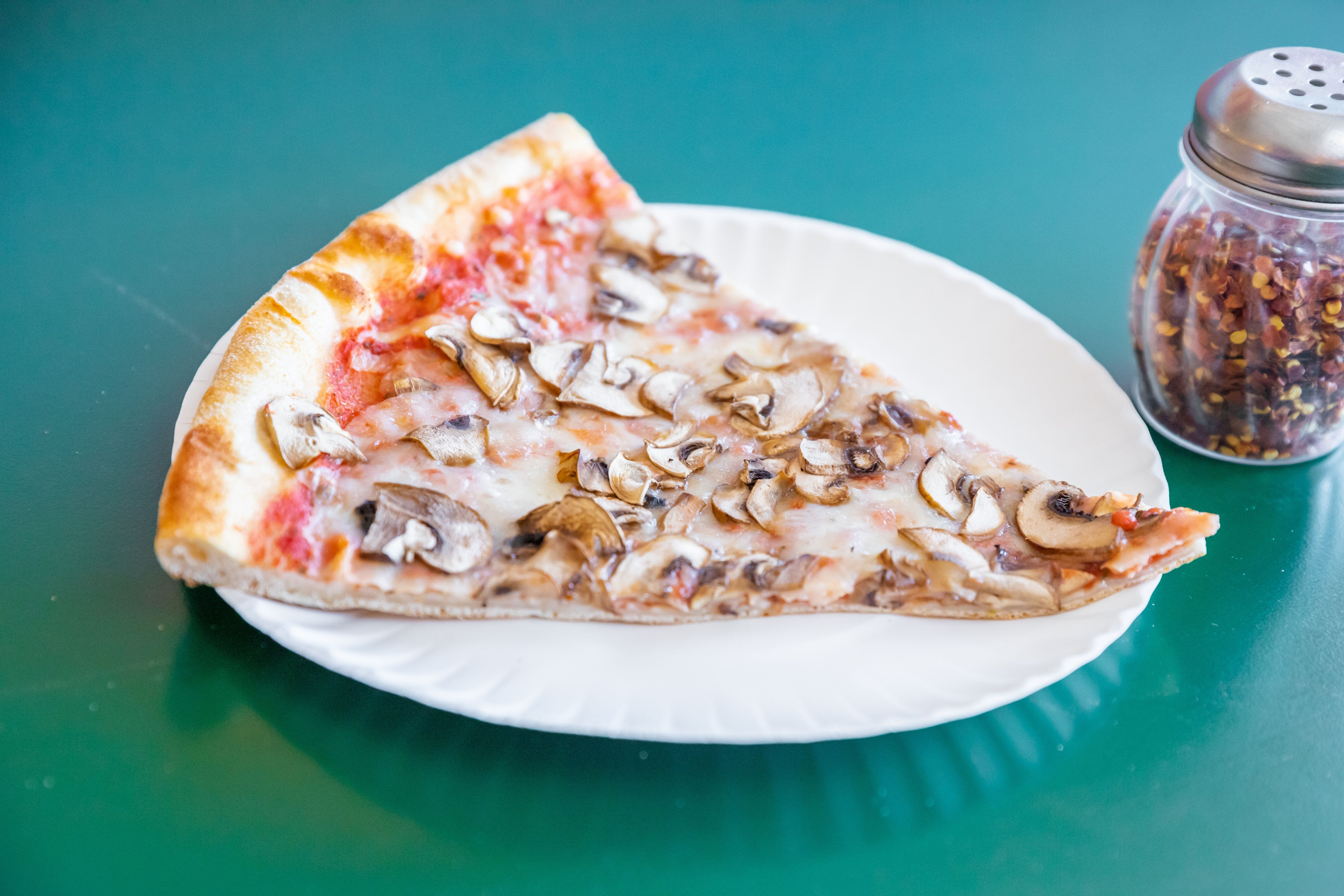 Order Mushrooms Pizza Slice - Slice food online from Uncle Sal's Italian Villa store, Budd Lake on bringmethat.com