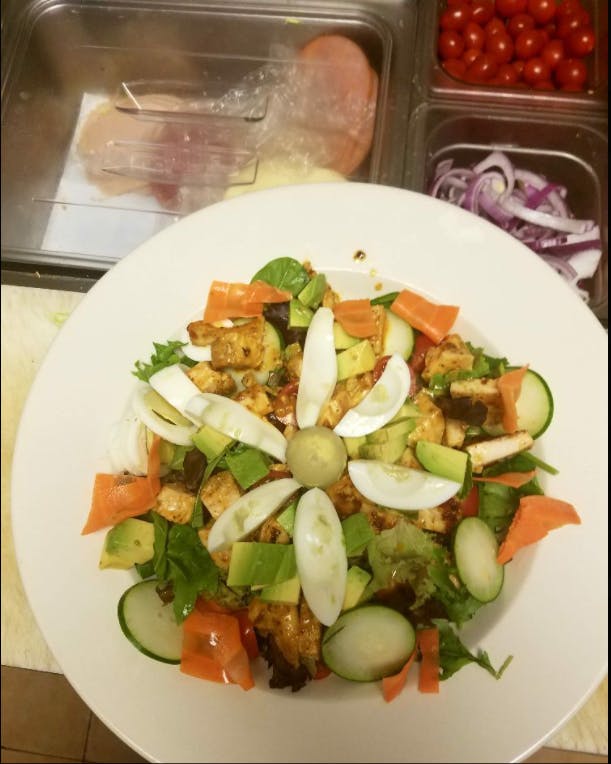 Order Tossed Grilled Chicken Salad - Large food online from Supreme Pizza & Grill store, Lumberton on bringmethat.com