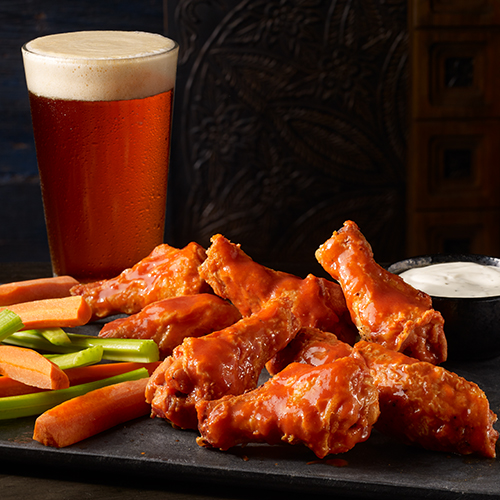 Order Traditional Wings - New food online from Studio Movie Grill store, Bakersfield on bringmethat.com