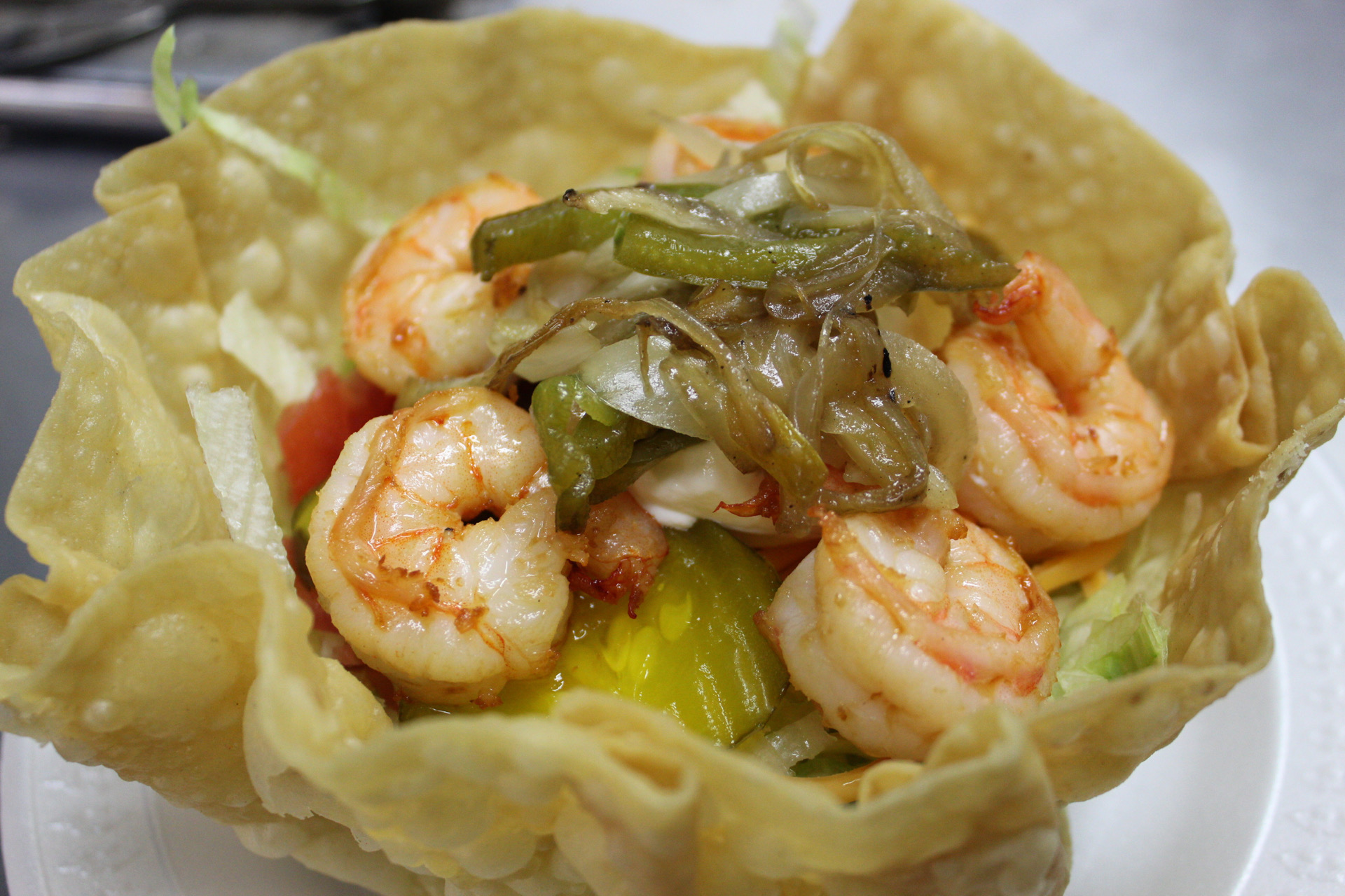 Order 50. Grilled Shrimp Tostada Salad food online from Yummy Taco store, Inwood on bringmethat.com