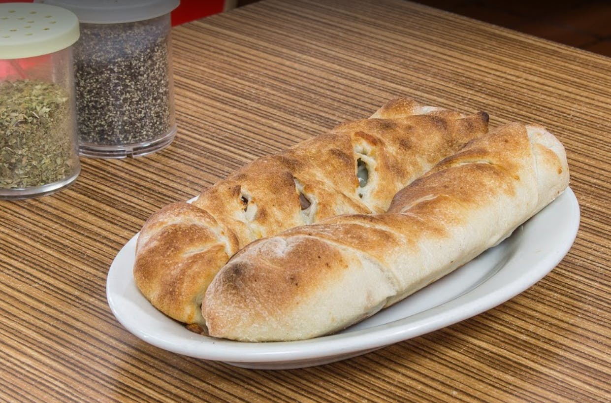 Order Ham & Cheese Calzone - Small food online from Lenny's Pizzeria store, Brooklyn on bringmethat.com