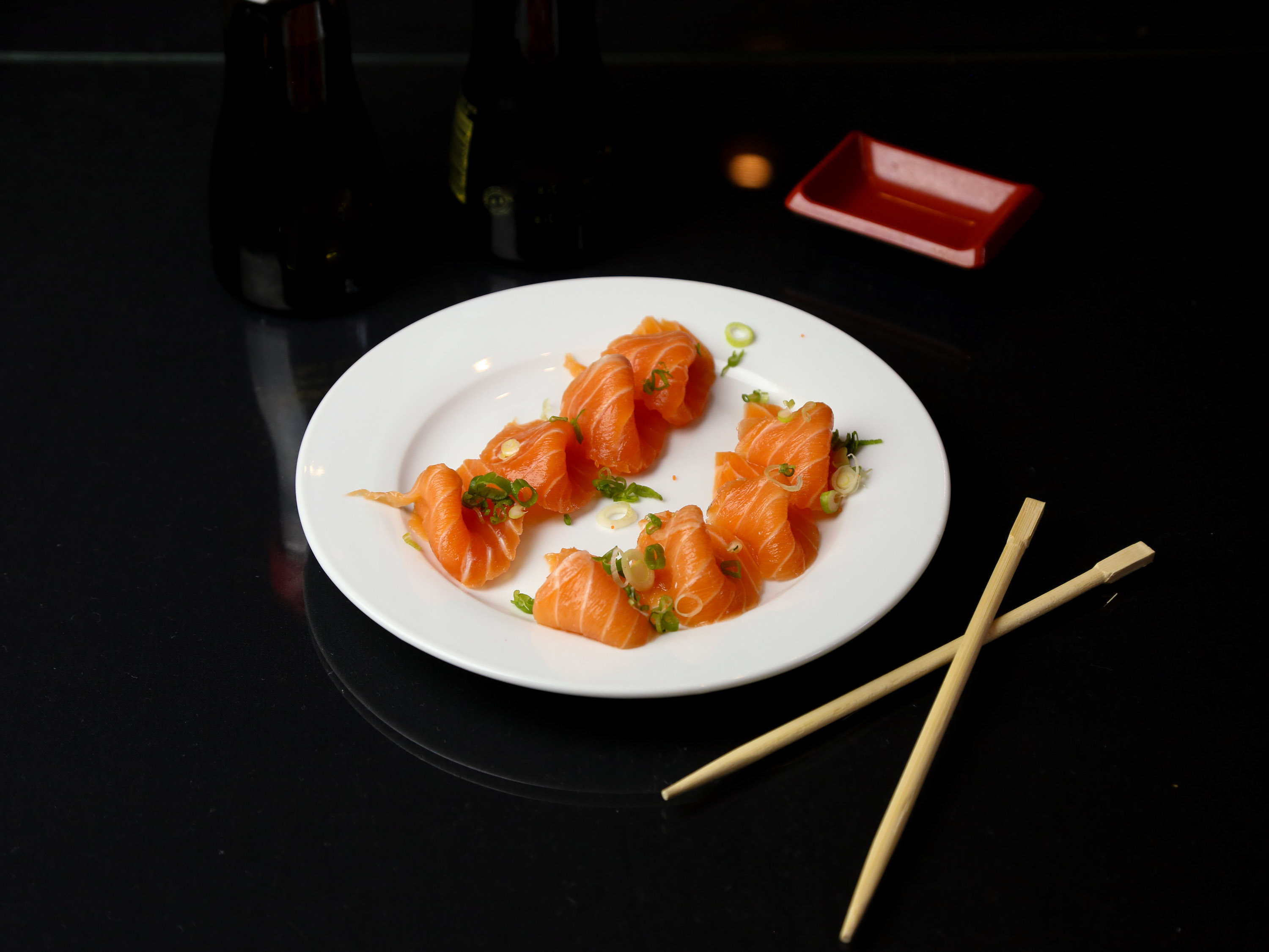Order Fresh Salmon Sashimi food online from Wasabi Sushi And Bar store, New Orleans on bringmethat.com