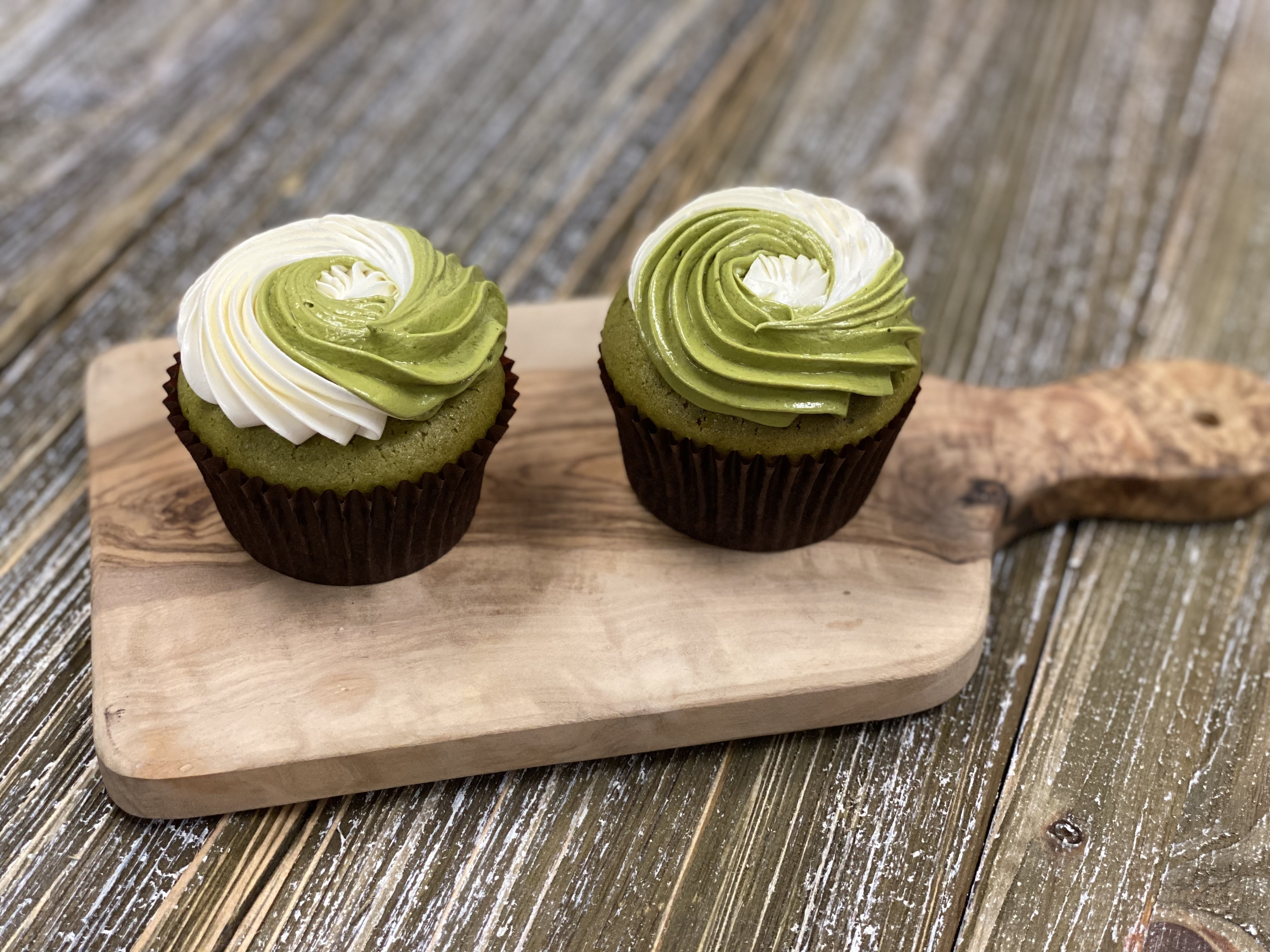 Order Set of 2 Matcha Swirl Cupcake food online from 43 & Company store, Milpitas on bringmethat.com