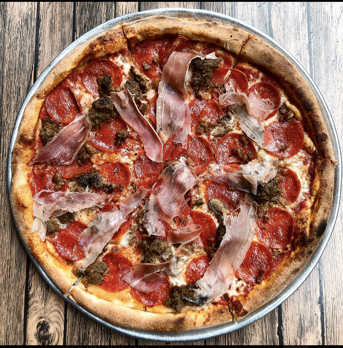 Order Pizza con Carni/ Meat Lovers food online from Tre Sorelle store, New York on bringmethat.com