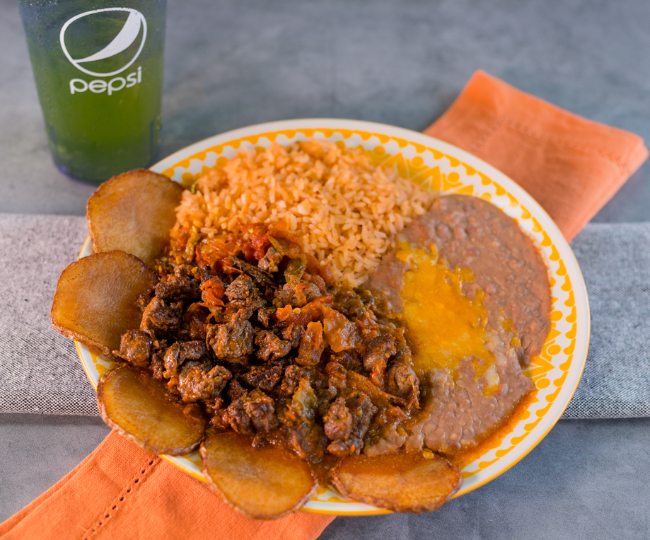 Order Carne Guisada food online from Chelinos Mexican Restaurant store, Oklahoma City on bringmethat.com