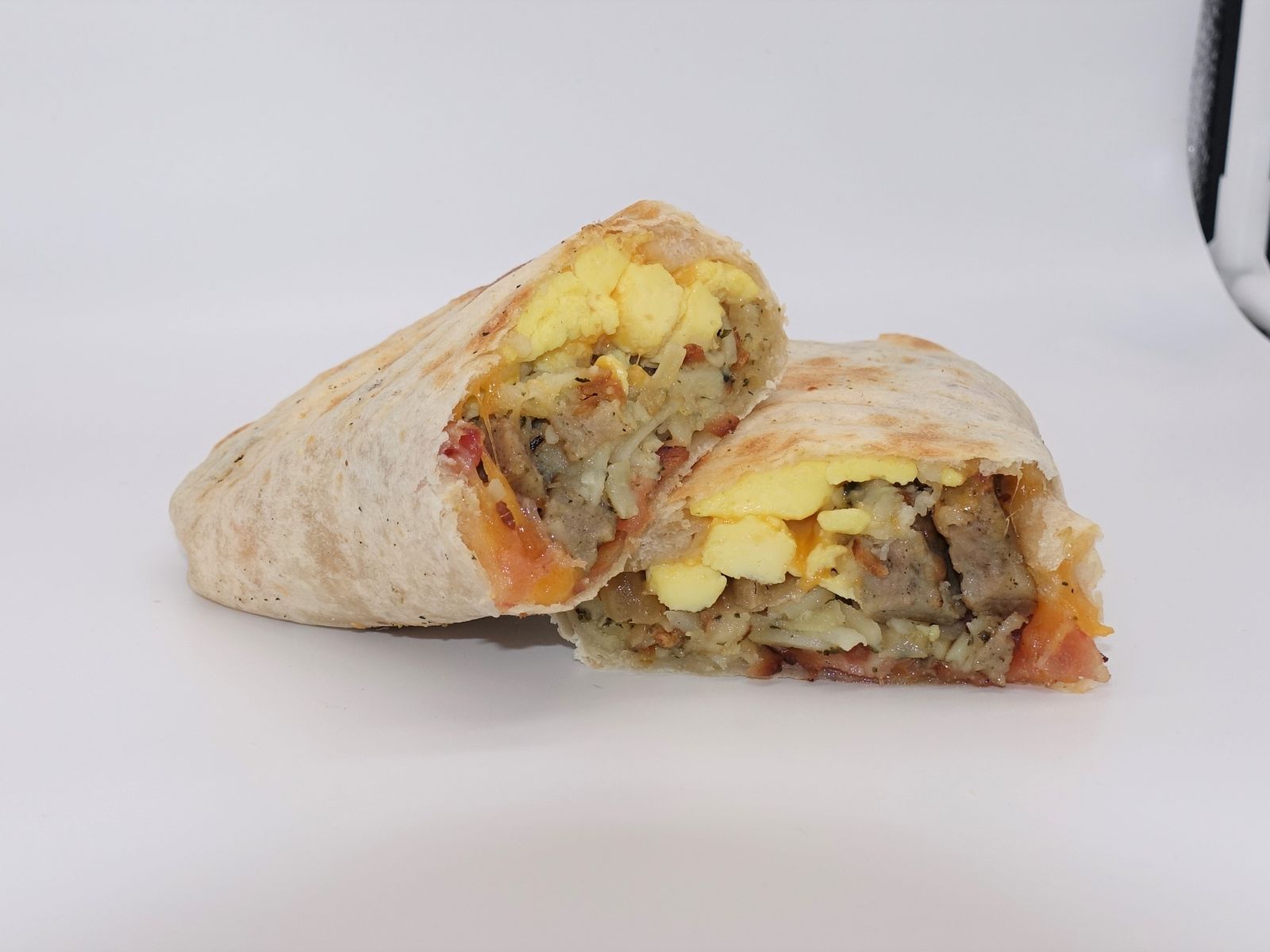 Order Sausage Breakfast Burrito food online from Charlotte Coffee House store, Dubuque on bringmethat.com