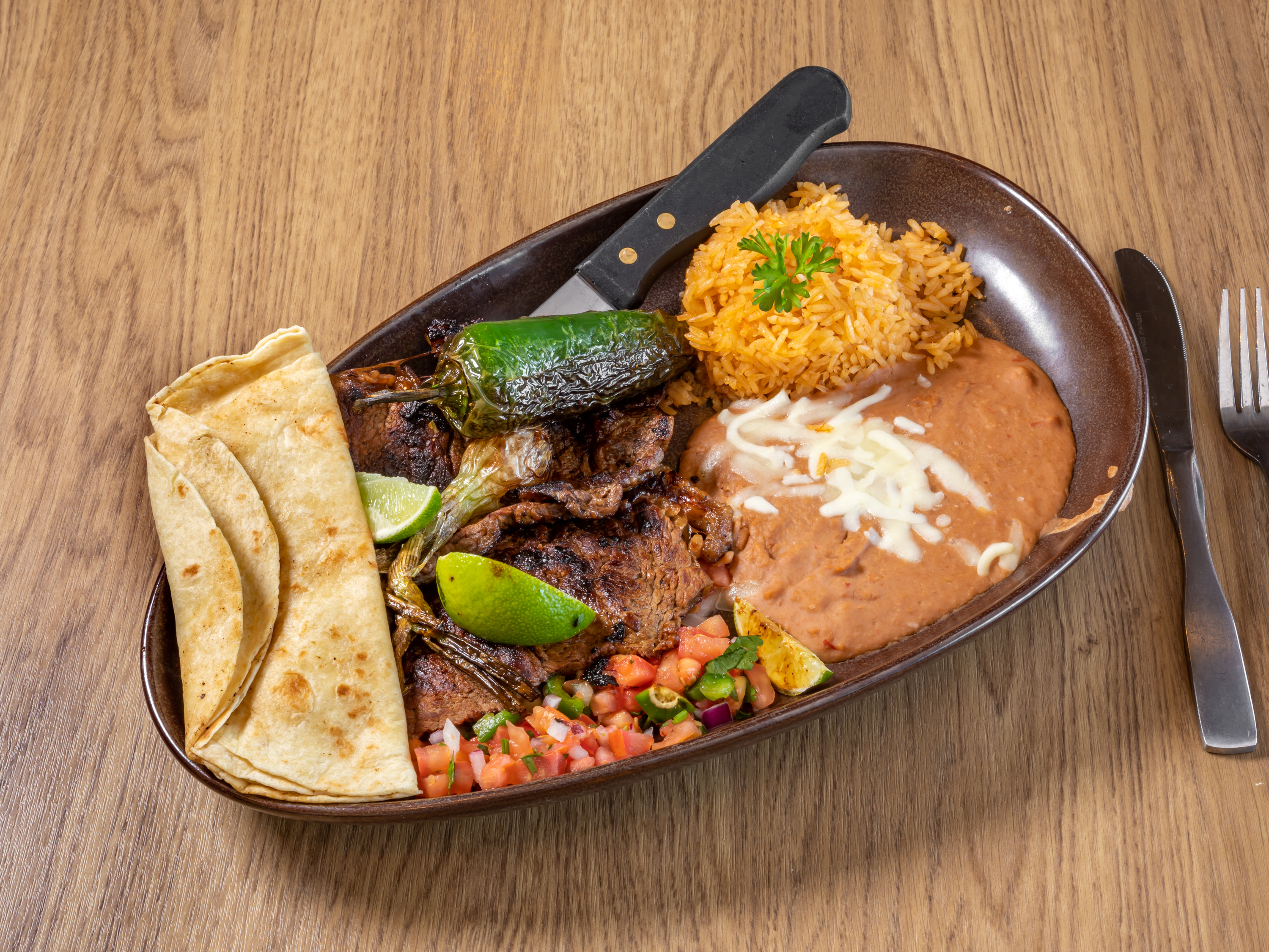 Order Carne Asada food online from Bravos Mexican Grill store, Tulsa on bringmethat.com