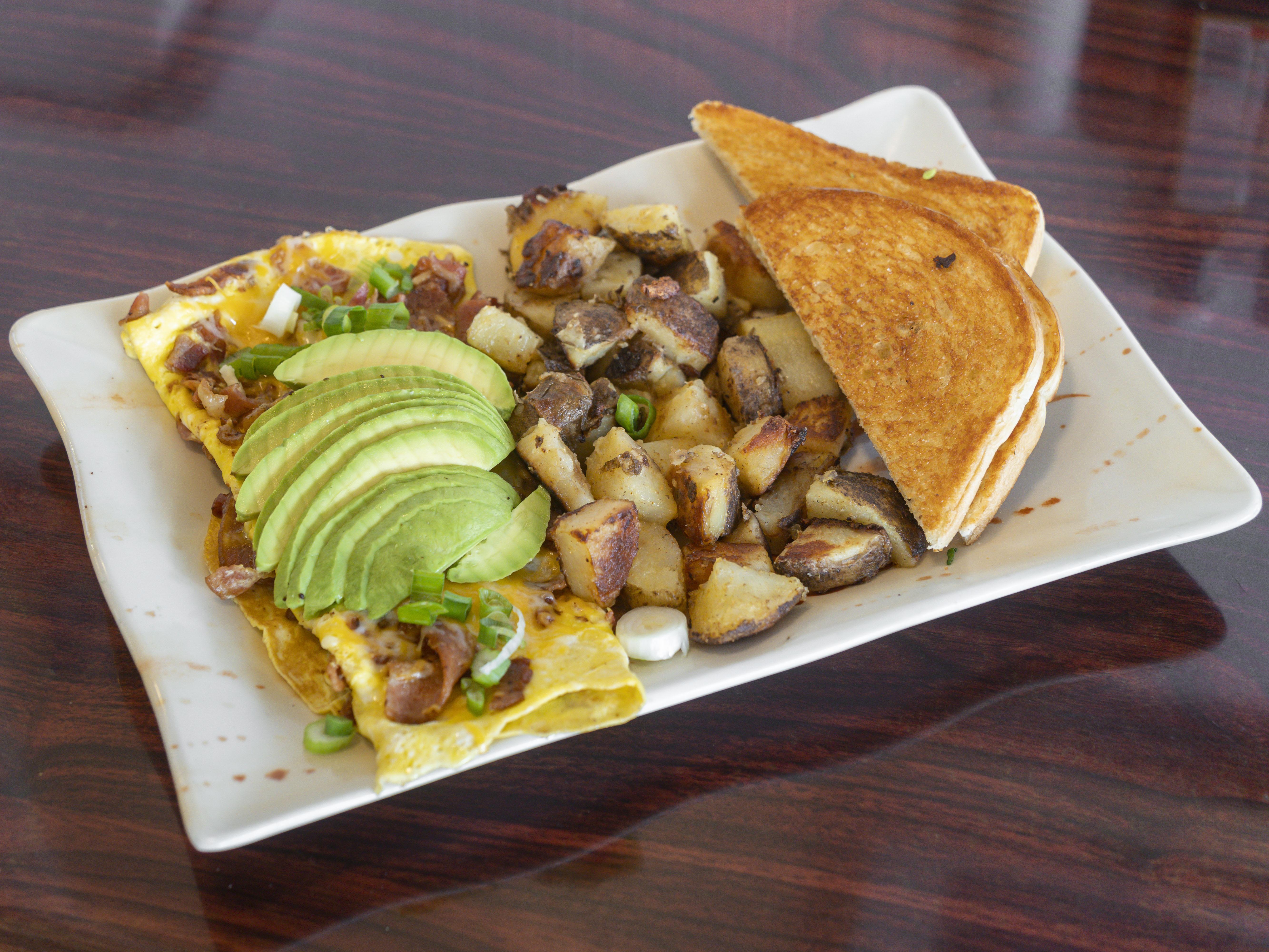 Order Saloon Deluxe Omelette food online from Sandwich Saloon store, San Pedro on bringmethat.com