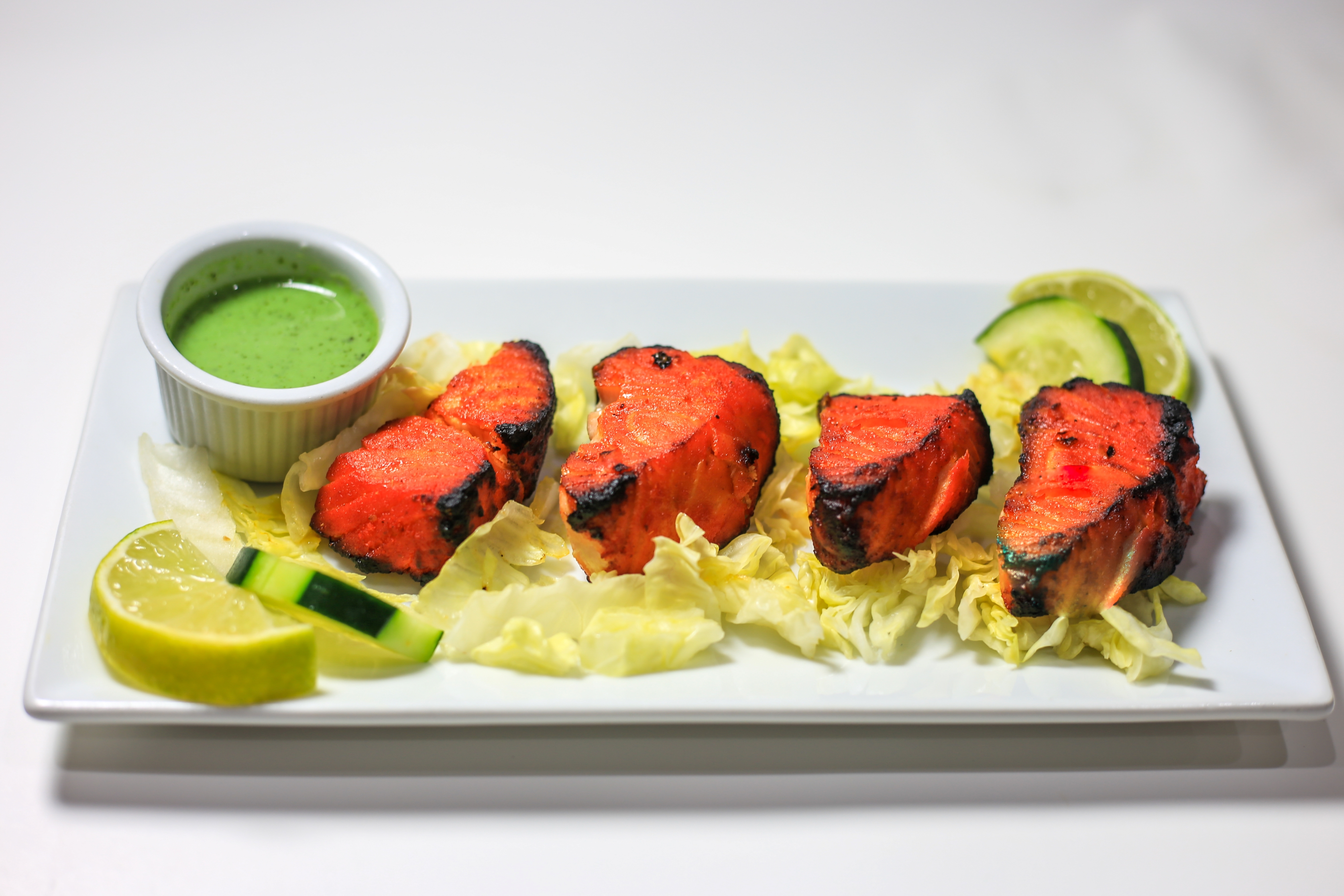 Order Fish Tikka food online from Sapphire Indian Restaurant store, Brooklyn on bringmethat.com