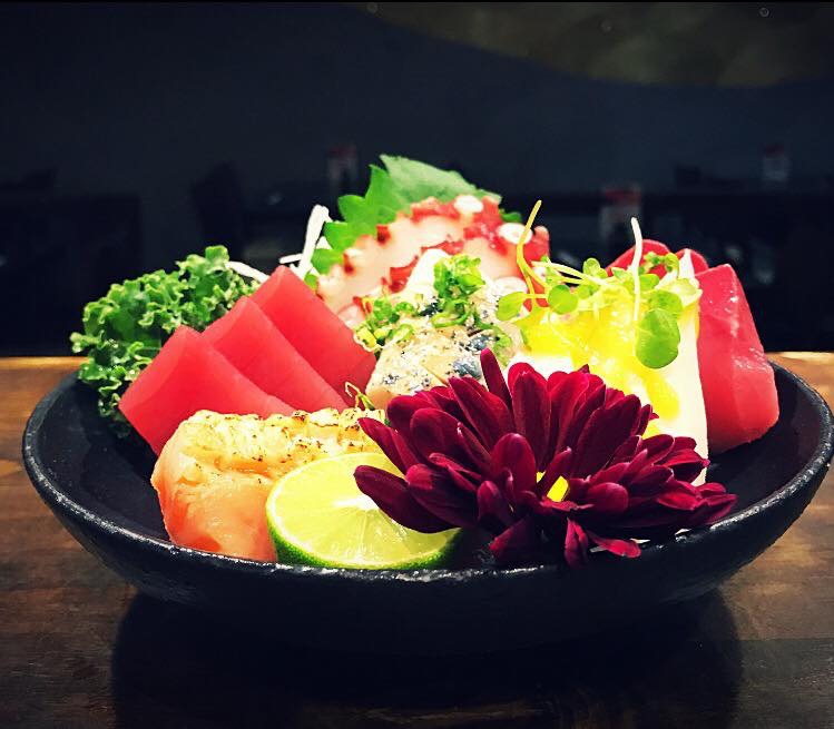 Order E8. Sashimi Deluxe food online from Sushi Bang Bang store, Austin on bringmethat.com