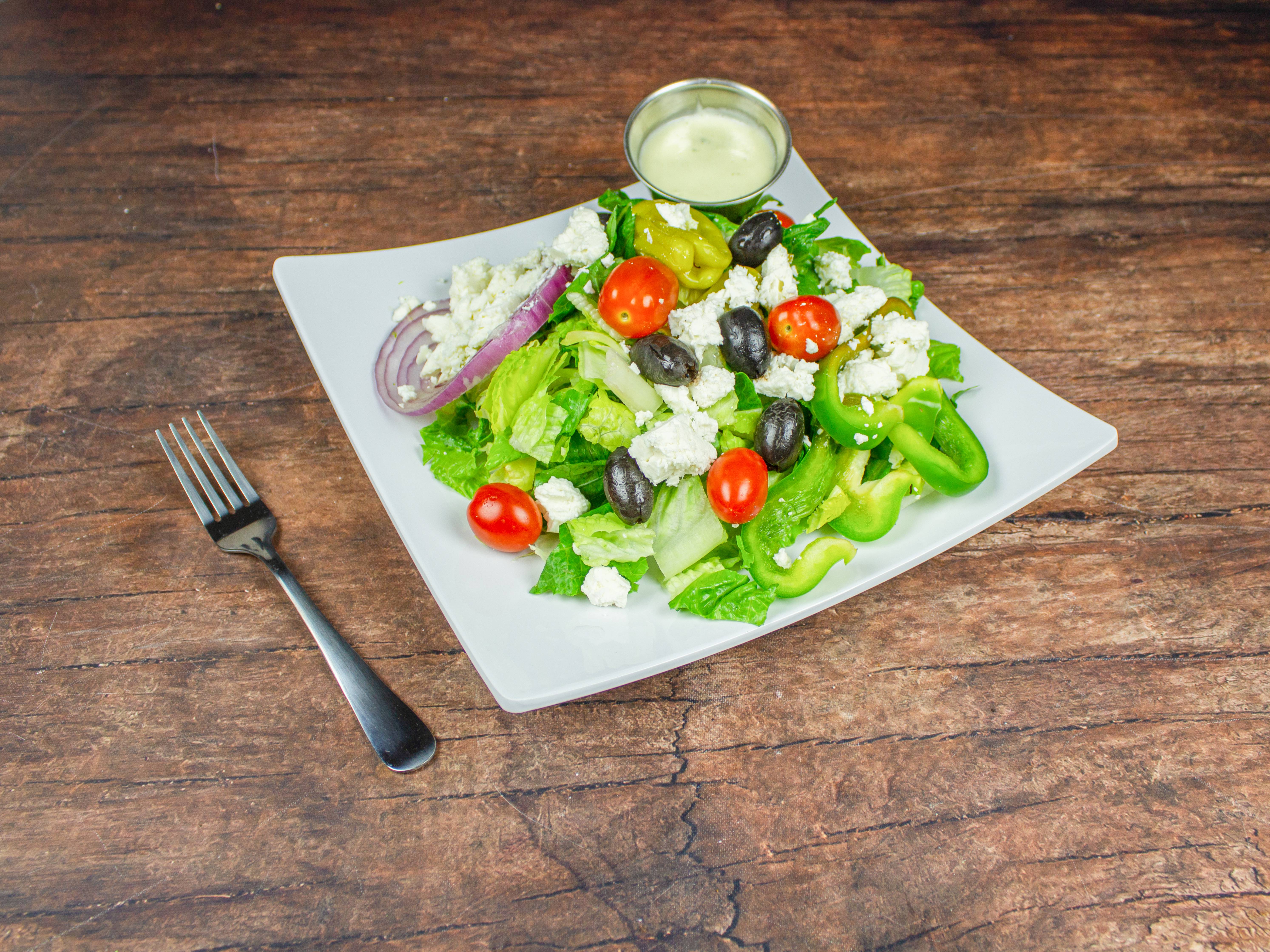Order Greek Salad food online from Leones Sub & Pizza store, Somerville on bringmethat.com